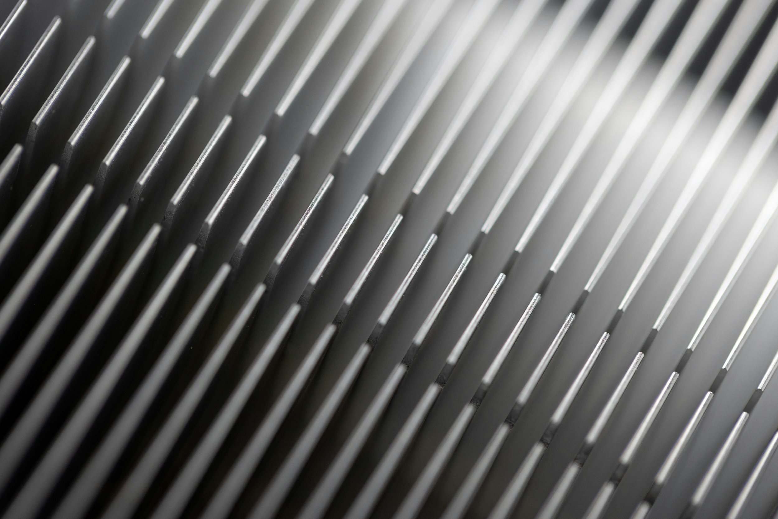 Close-up of metal grill or grate with parallel slats.