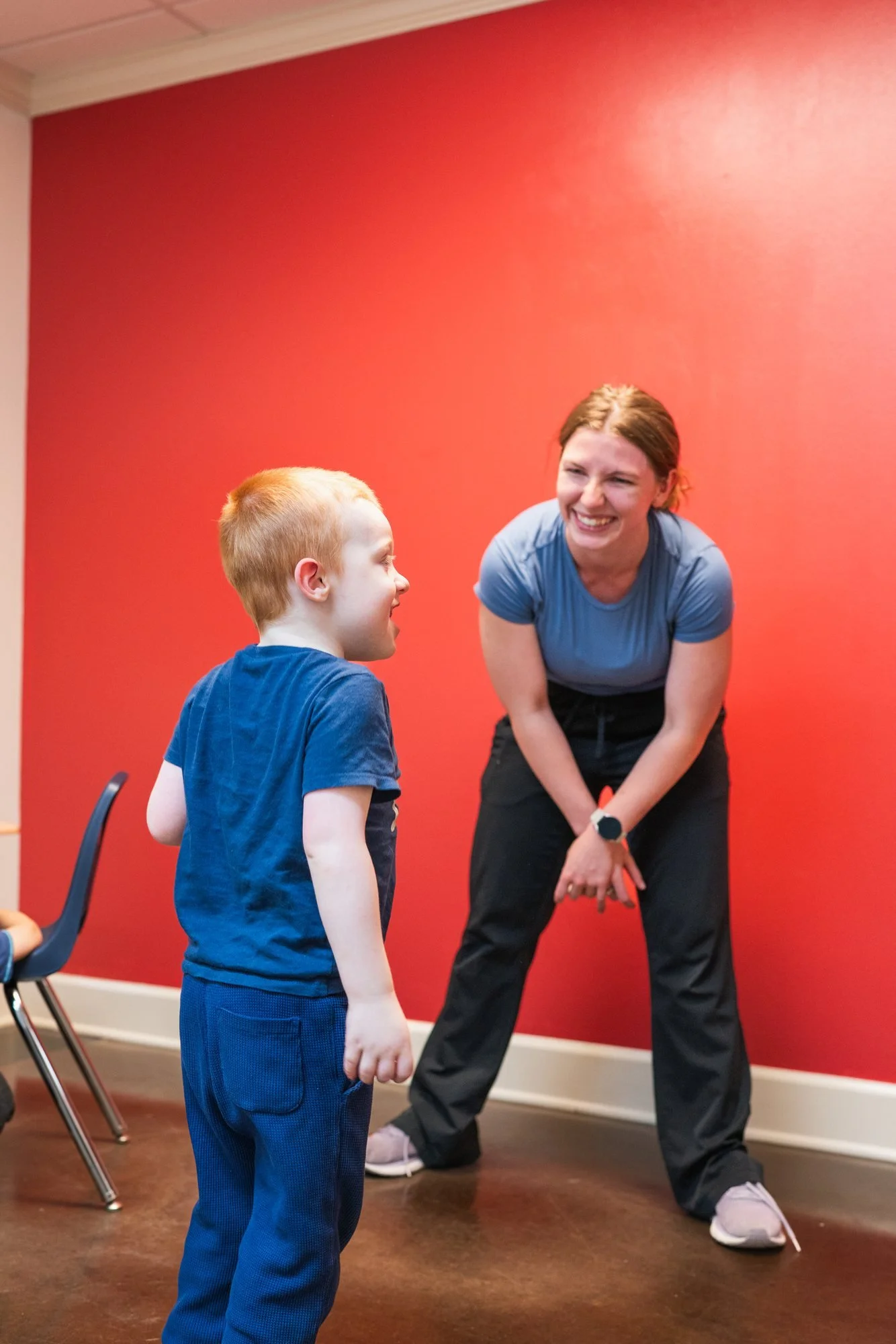 StarBright Centers therapist and a child laughing together during a session