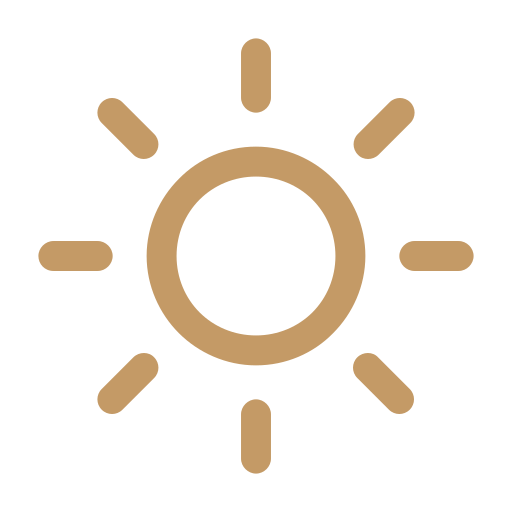 A minimalist icon of the sun with a circular center and radiating lines.