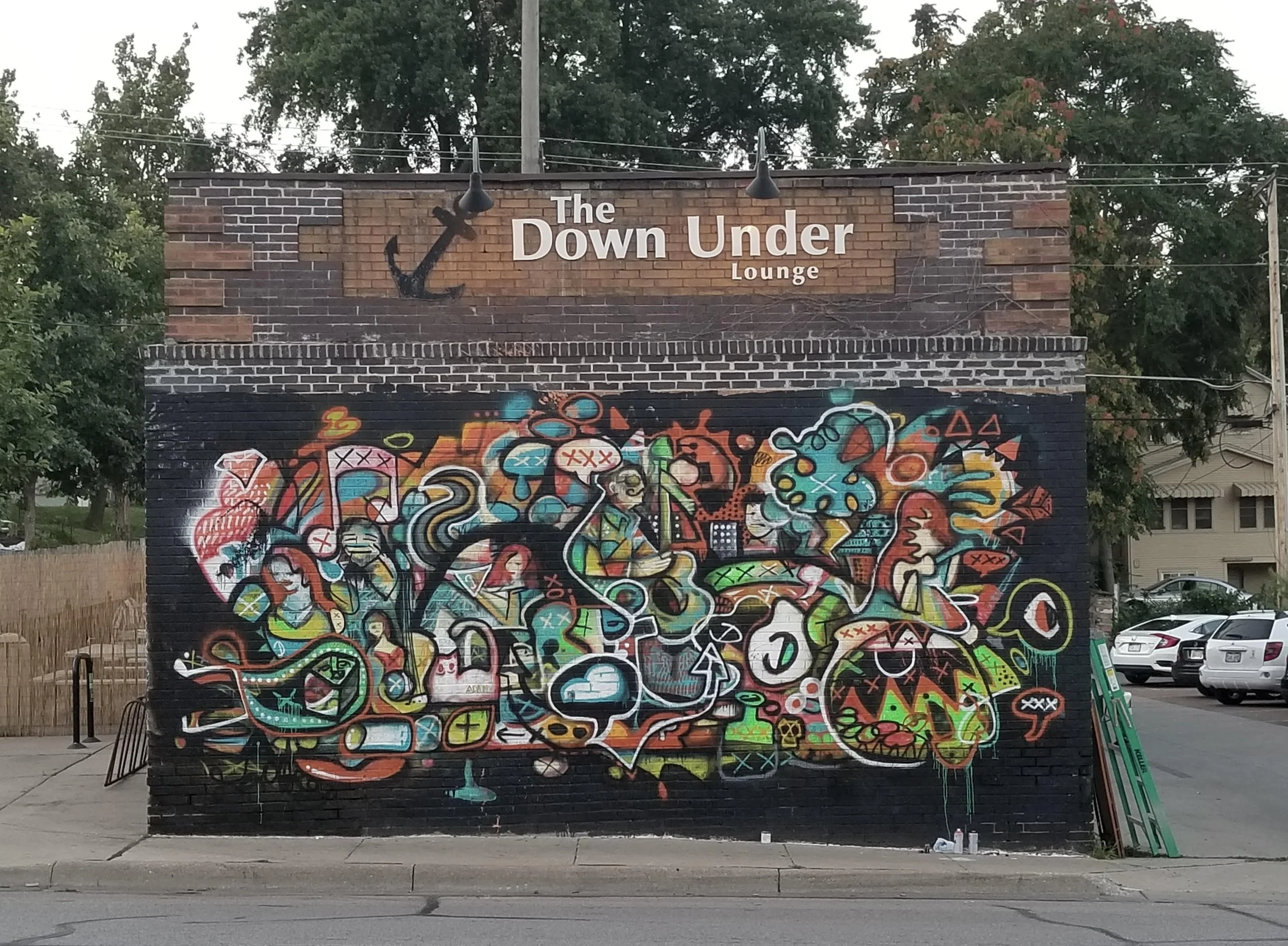 Down Under Lounge, 2017
spray paint on brick, 25' x 15'