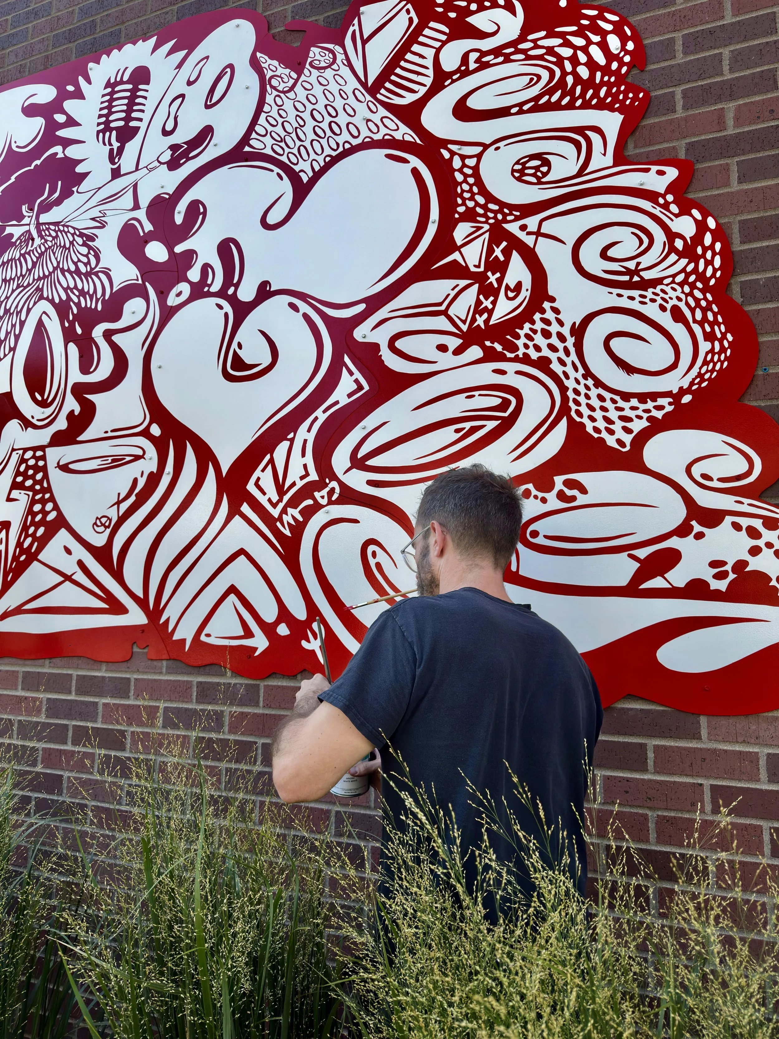 Putting the finishing touches on the bolts.