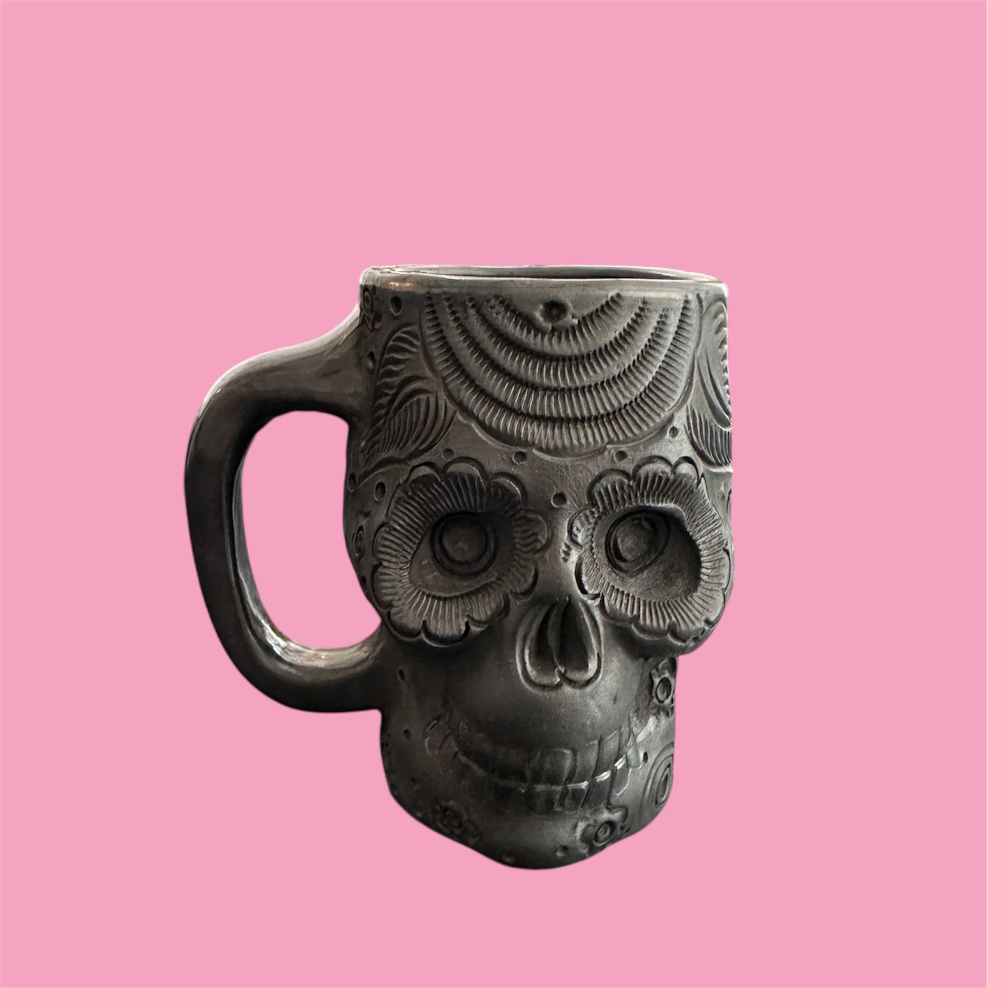 Mexican day of the dead skull Barro Negro, black pottery from Oaxaca