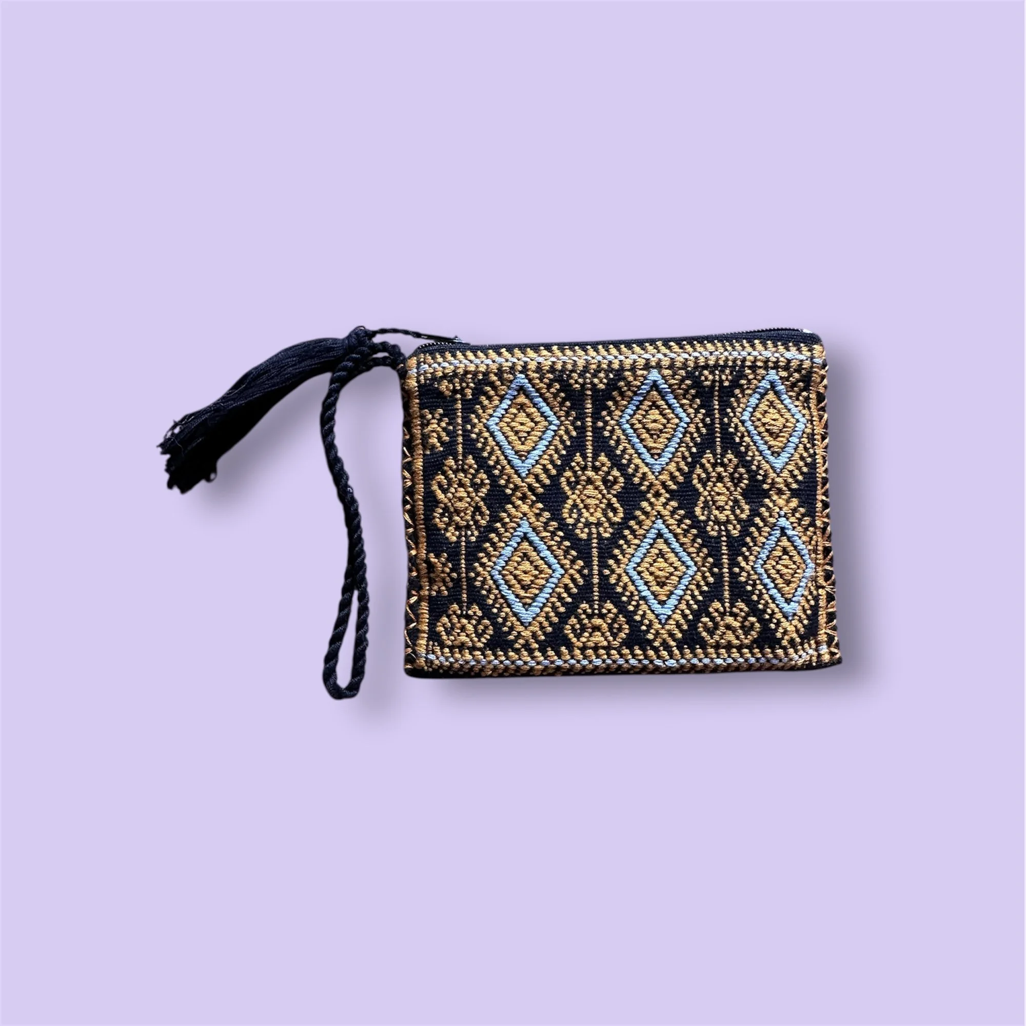 Black embroidered coin purse handcrafted in Mexico.