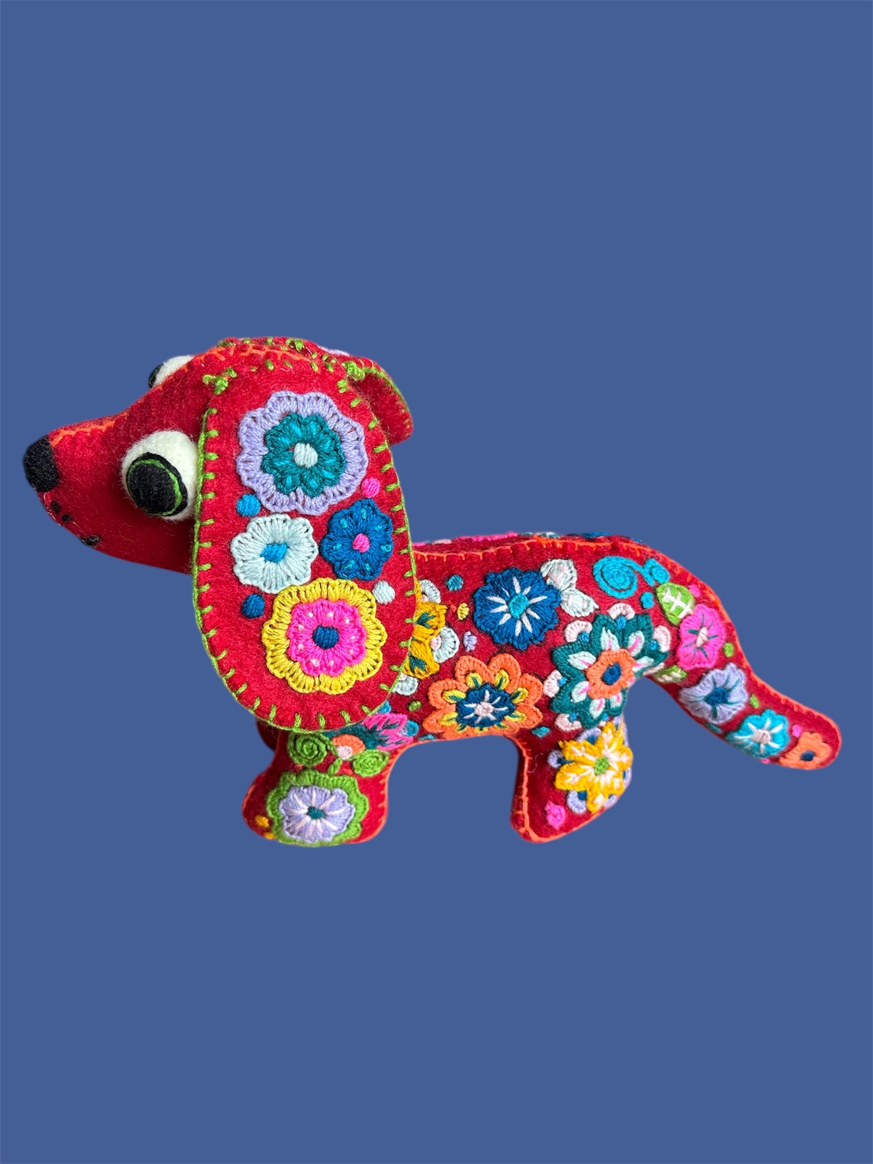 Embroidered dog soft toy handcrafted in Mexico.
