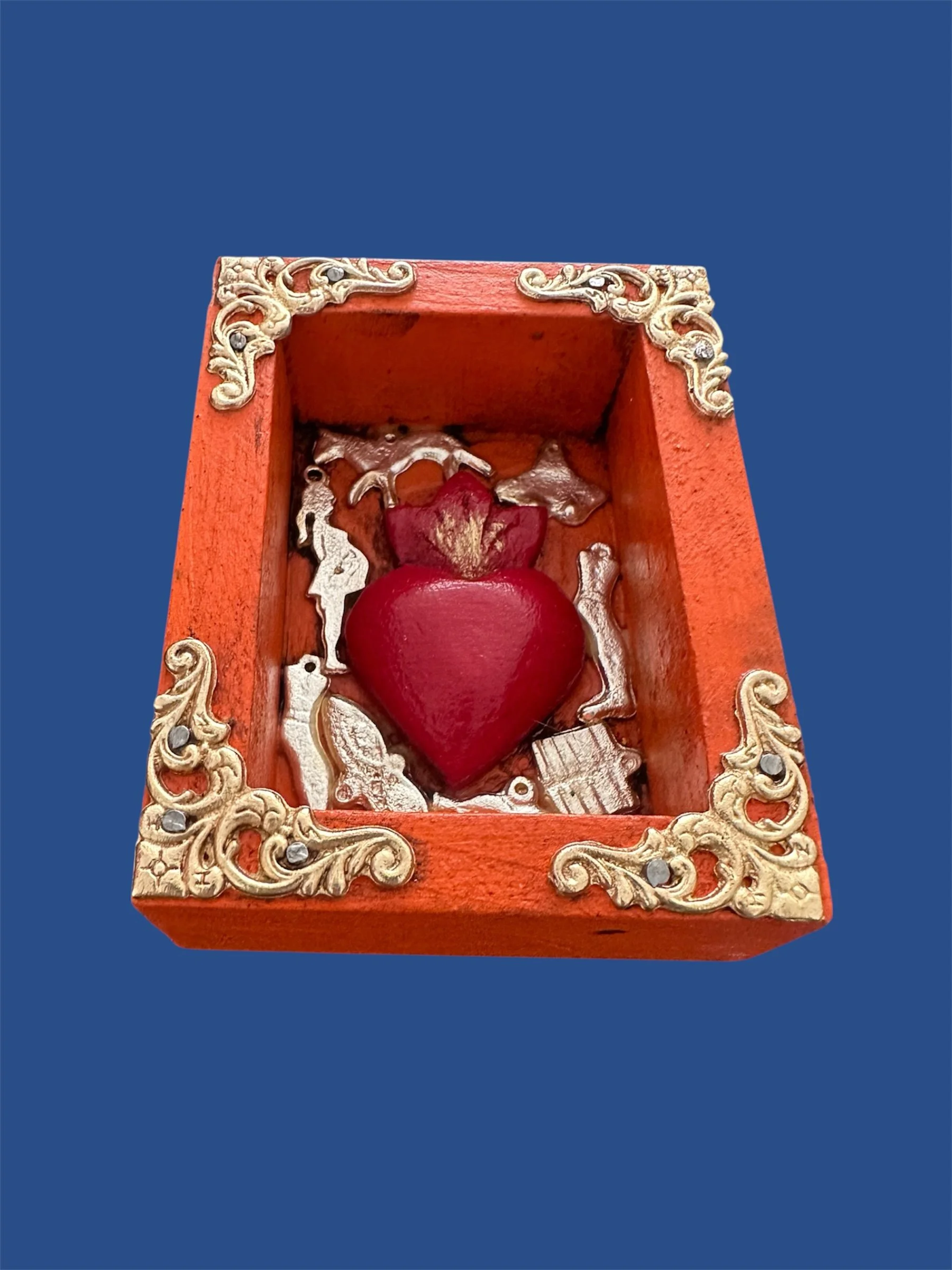 Decorative Mexican nicho with milagrito heart handmade in Mexico.