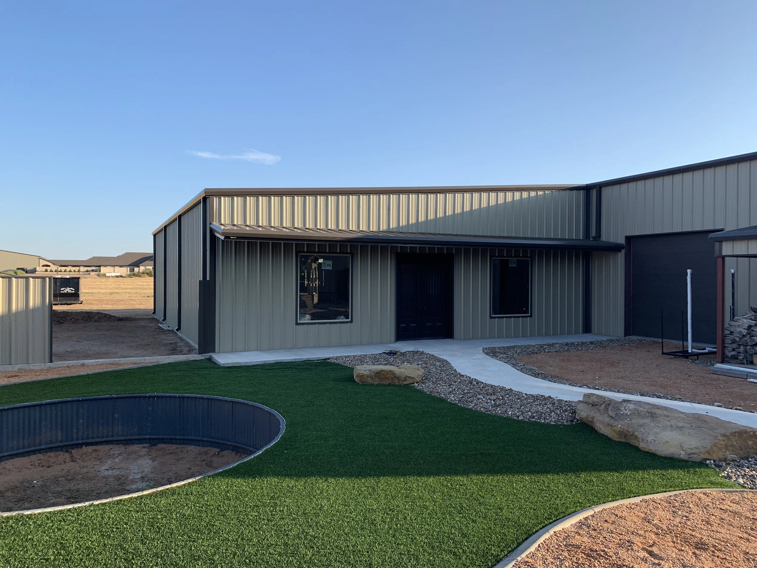 Updated facade with accessible walkway and low maintenance landscaping.