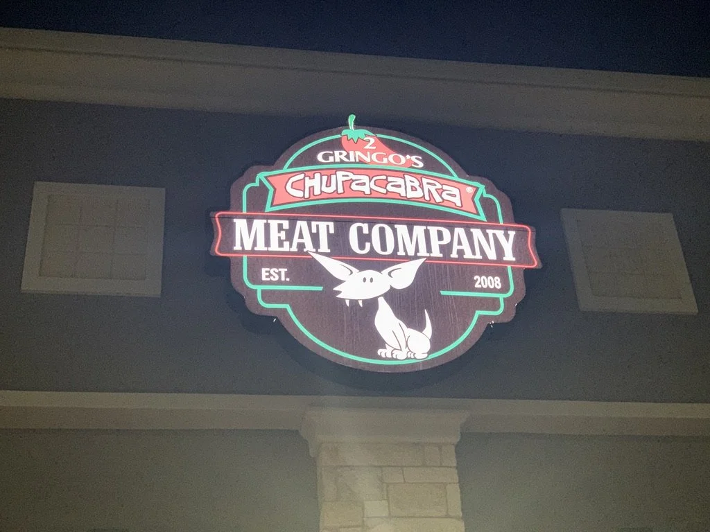 Brand signage installed with electrical connection.