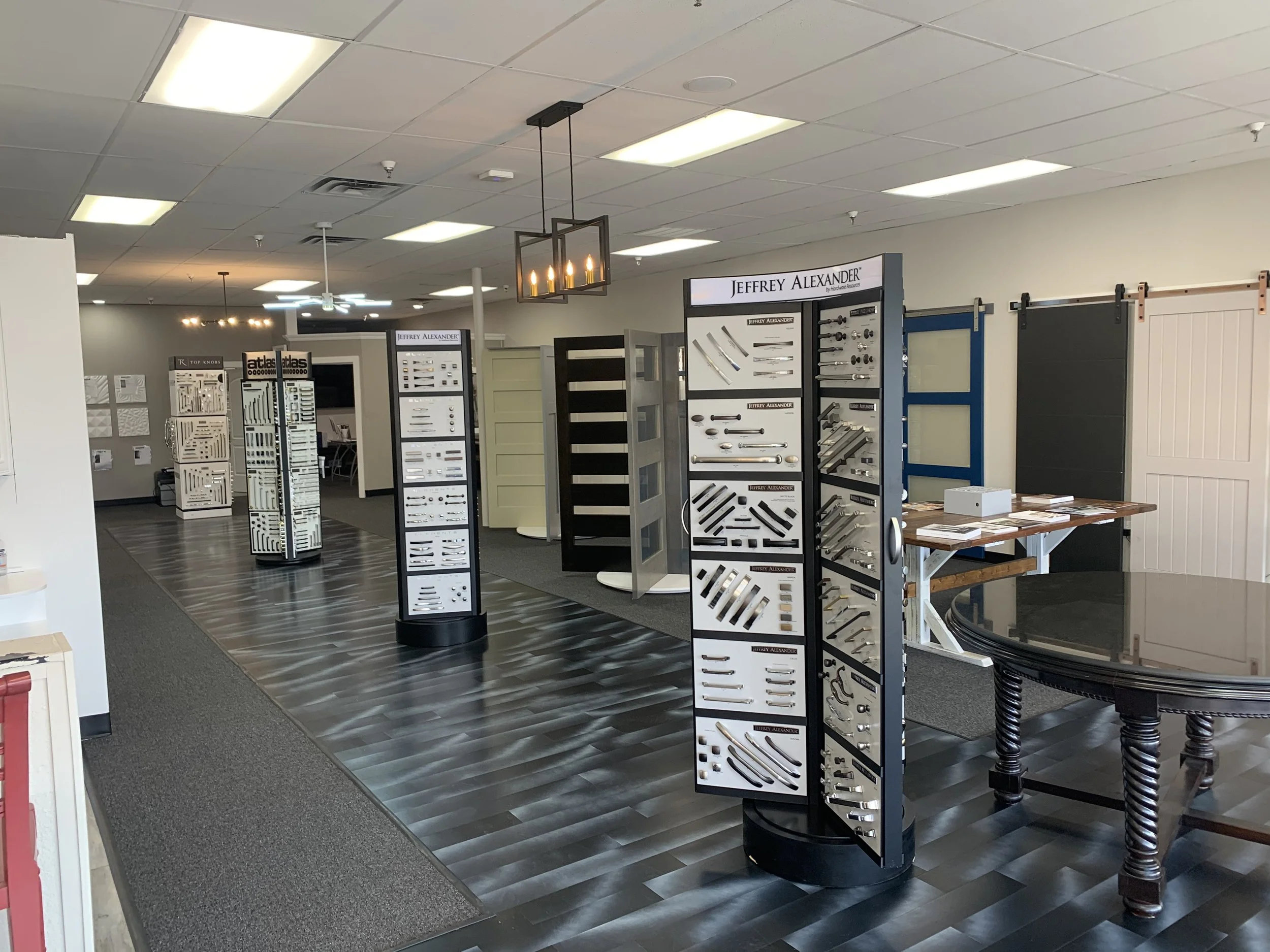 Finished retail floor with fixture layout, lighting, and customer circulation paths.