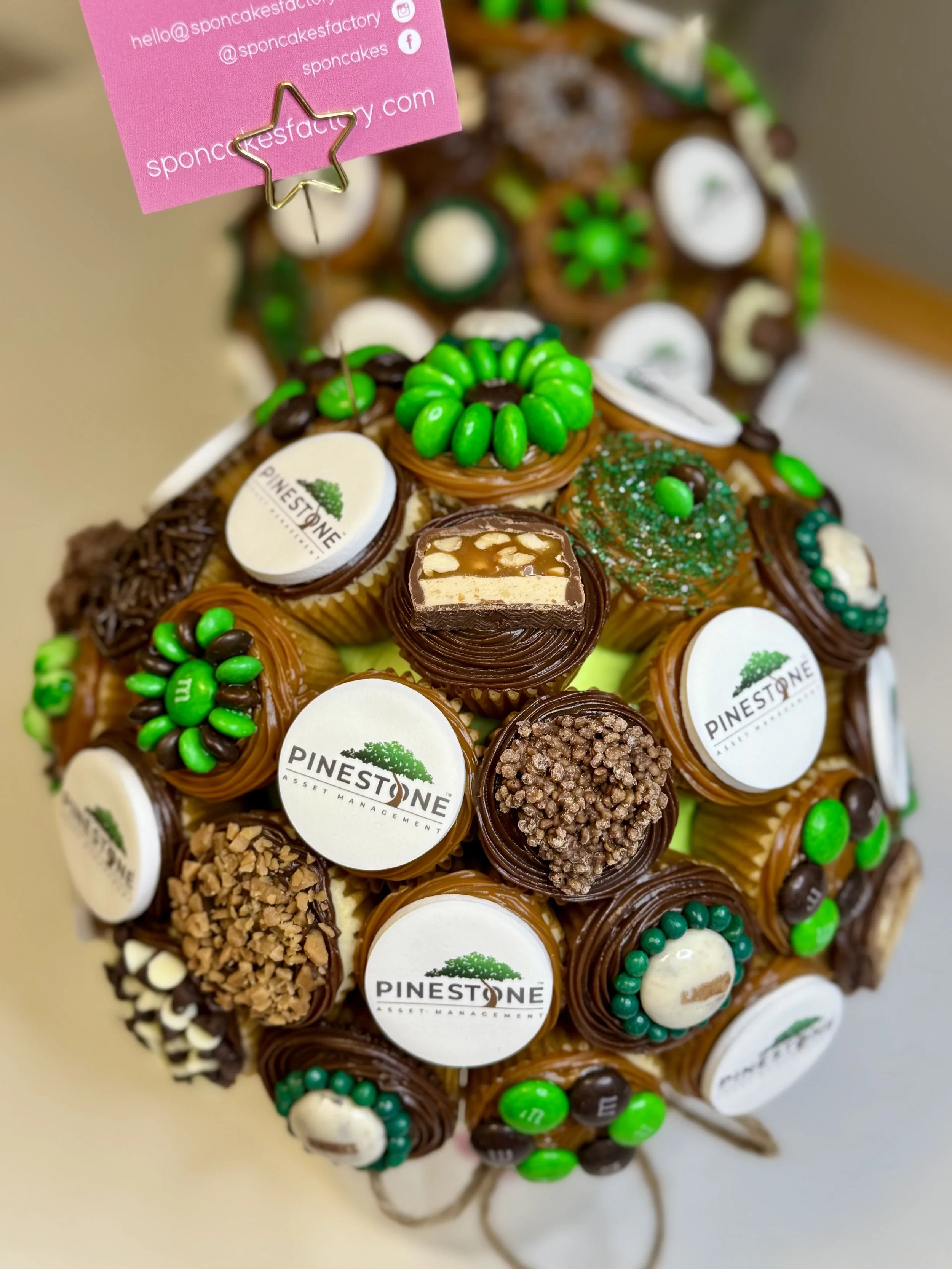 Corporate themed cupcake bouquet with logo edible toppers