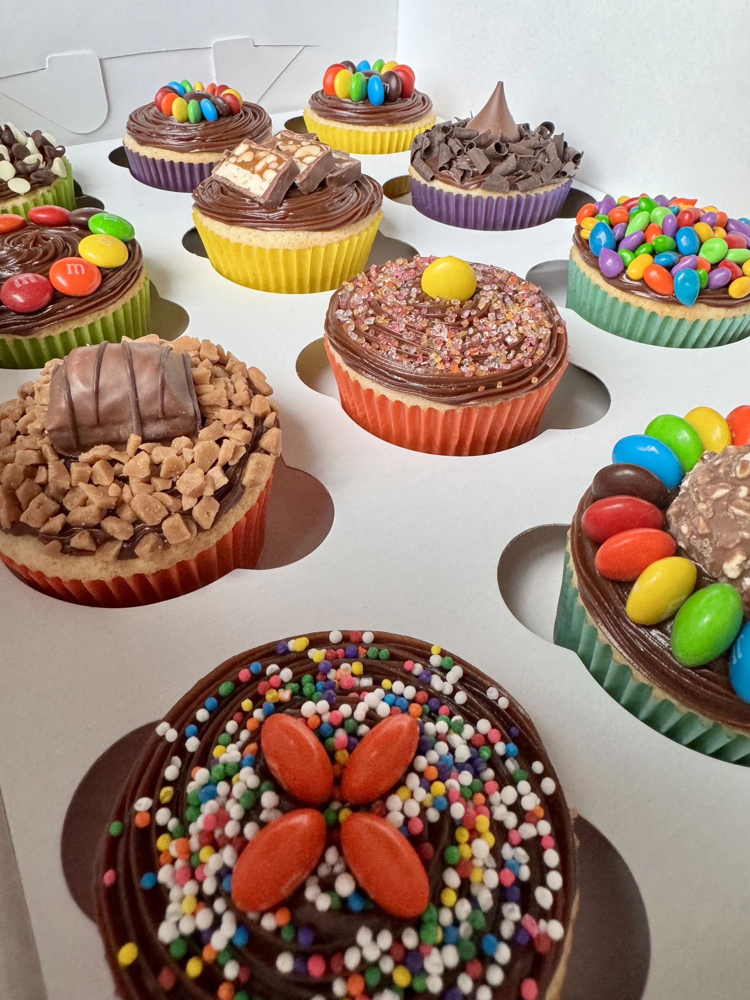 Classic cupcakes, beautifully decorated and freshly baked