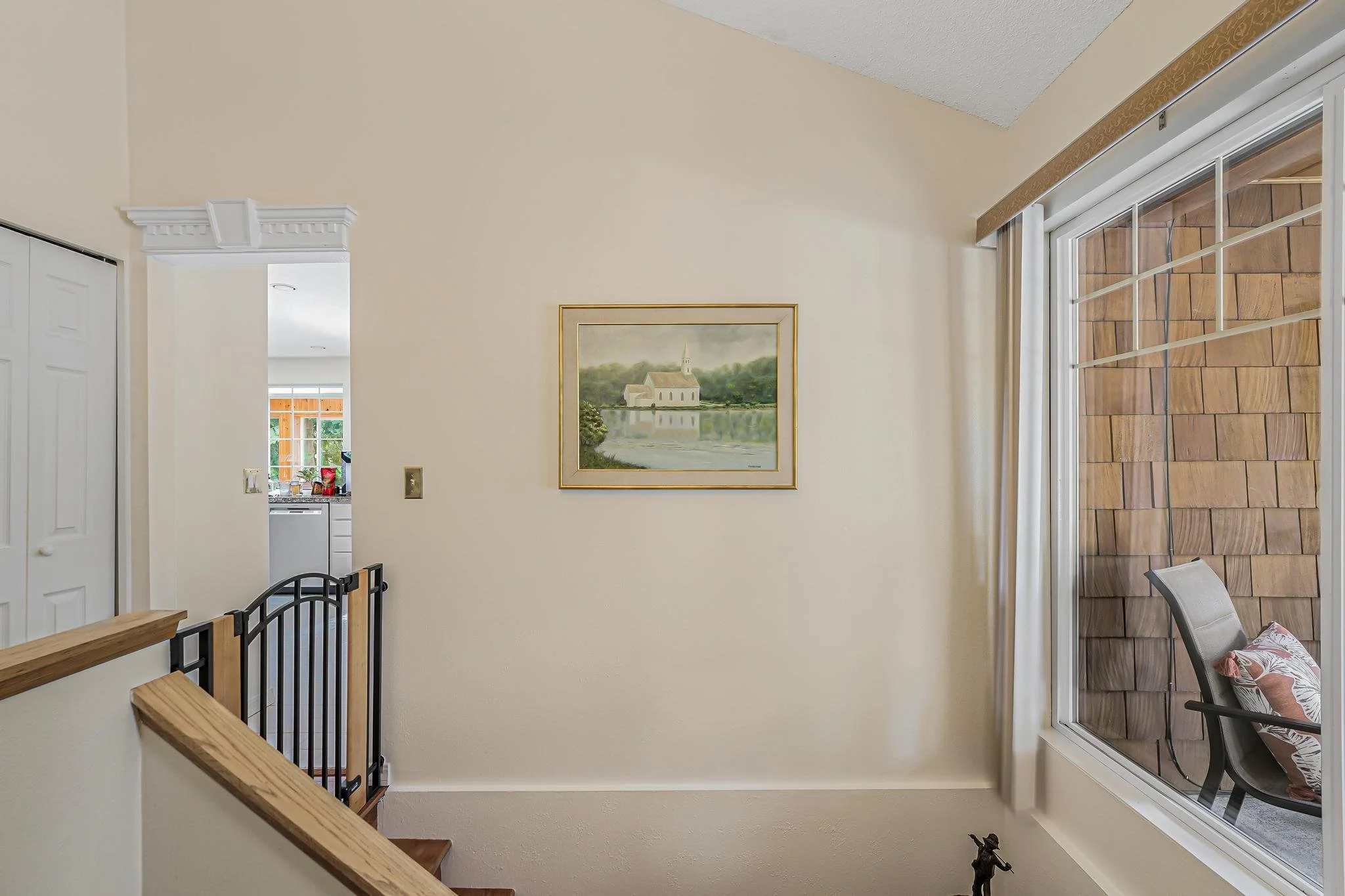 Secure stairway with safety gate, ensuring residents and visitors can move safely between levels.