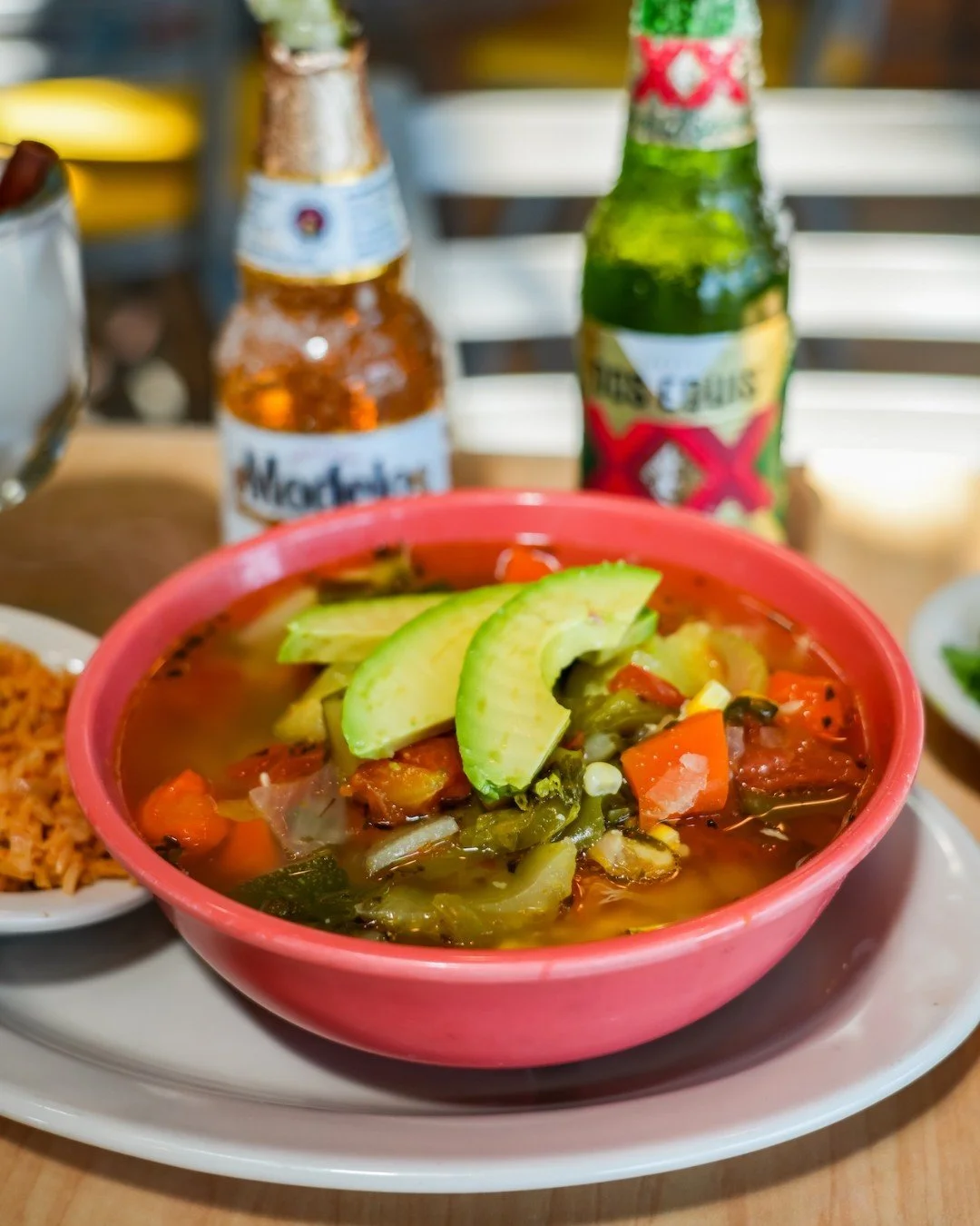 Warm your soul with our Chicken Caldo! 🍲💛 

Made with fresh vegetables, tender chicken, rice, and sliced avocado, it's comfort in a bowl served with warm tortillas. Stop by for lunch and warm up today! 

#mamamargies #texmex