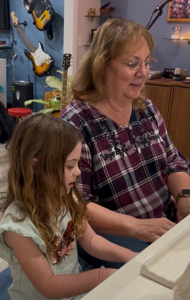 Student taking piano lessons in San Diego at Lovley Piano Studio