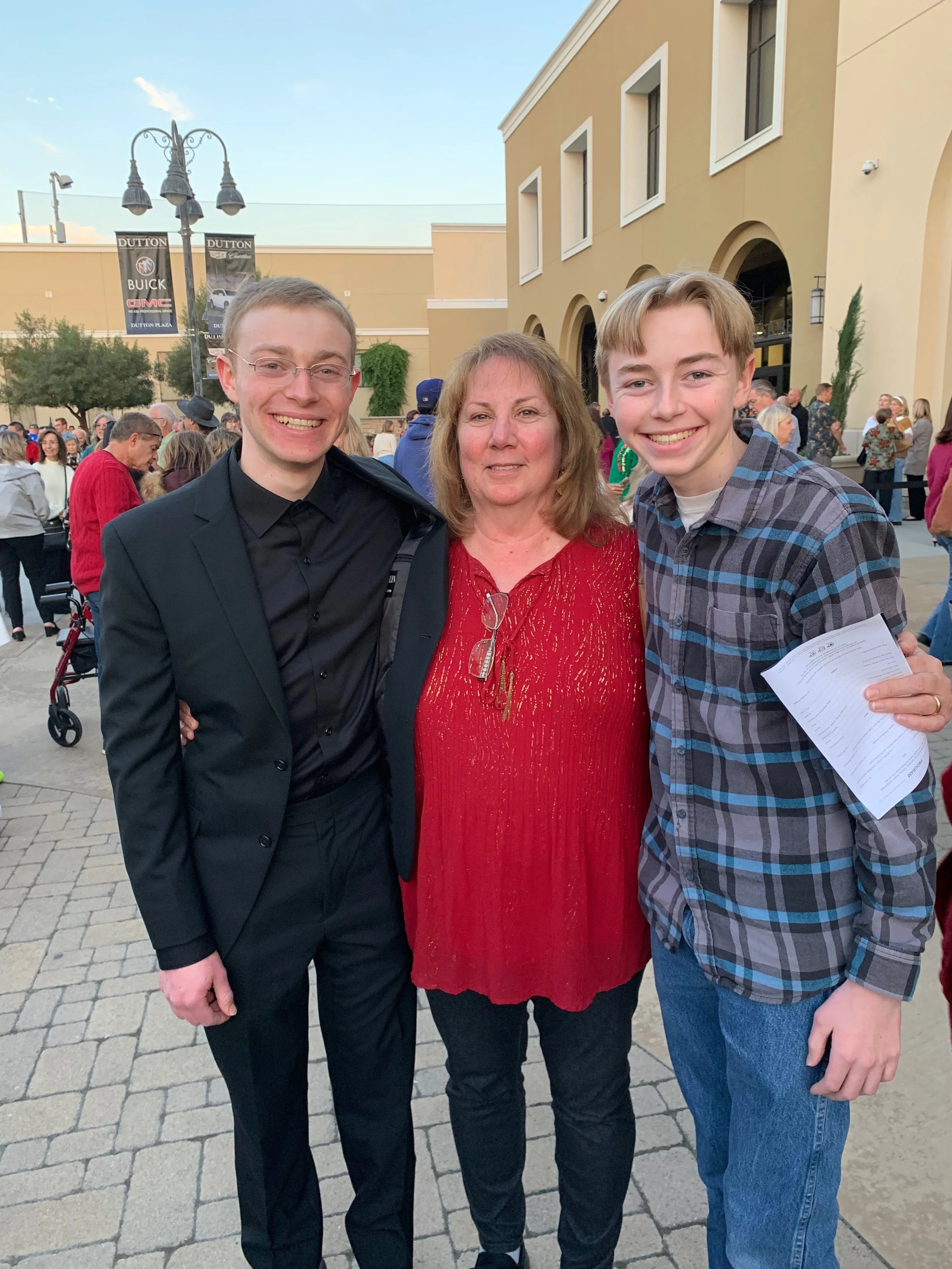 Advanced piano students after a recital performance with their teacher, Tracy Lovley