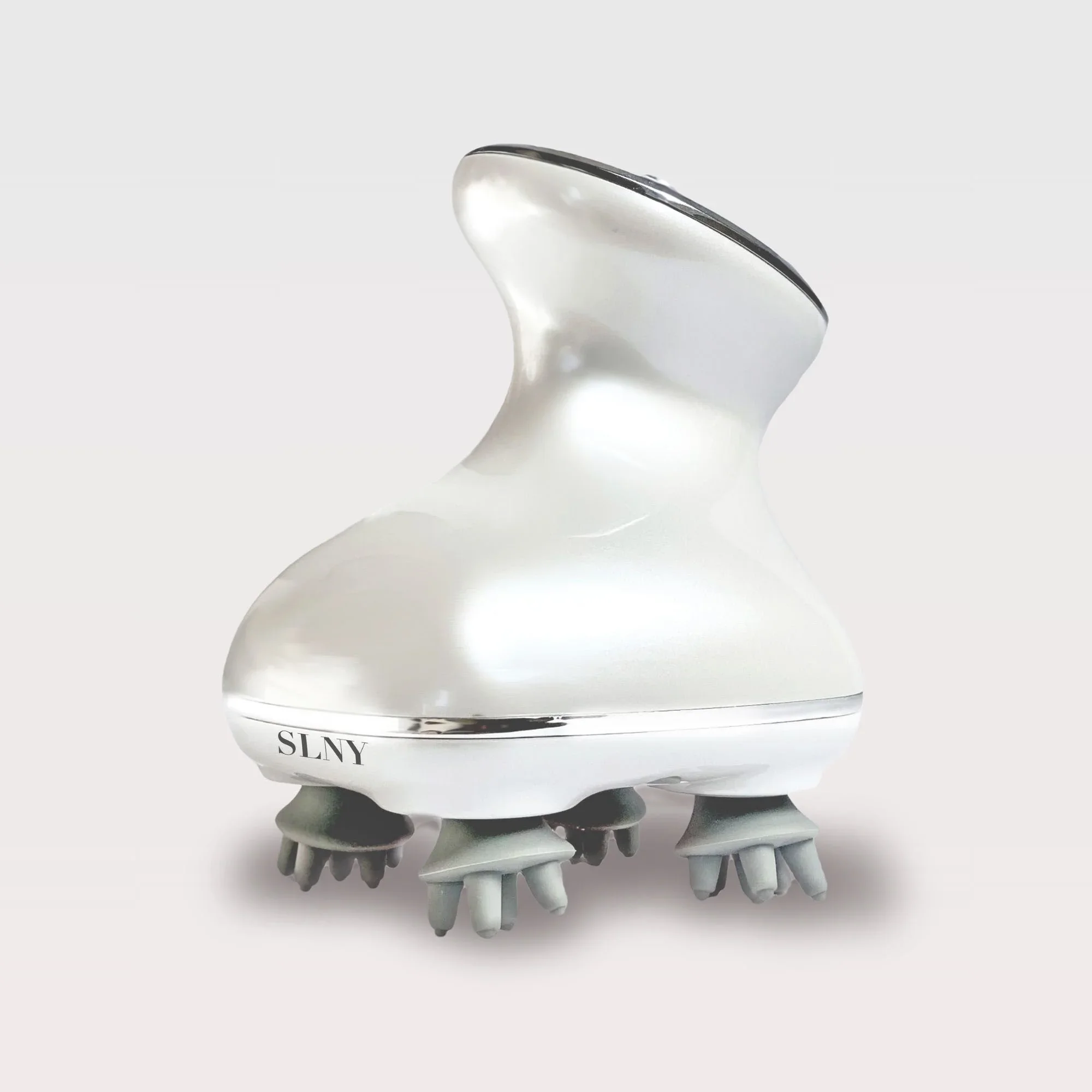 SOLARIS SCALP MASSAGER - Gentle rotating massage with red light therapy to support scalp circulation and overall scalp health. Soothing, relaxing and stimulating. Use on head, neck and shoulders.

