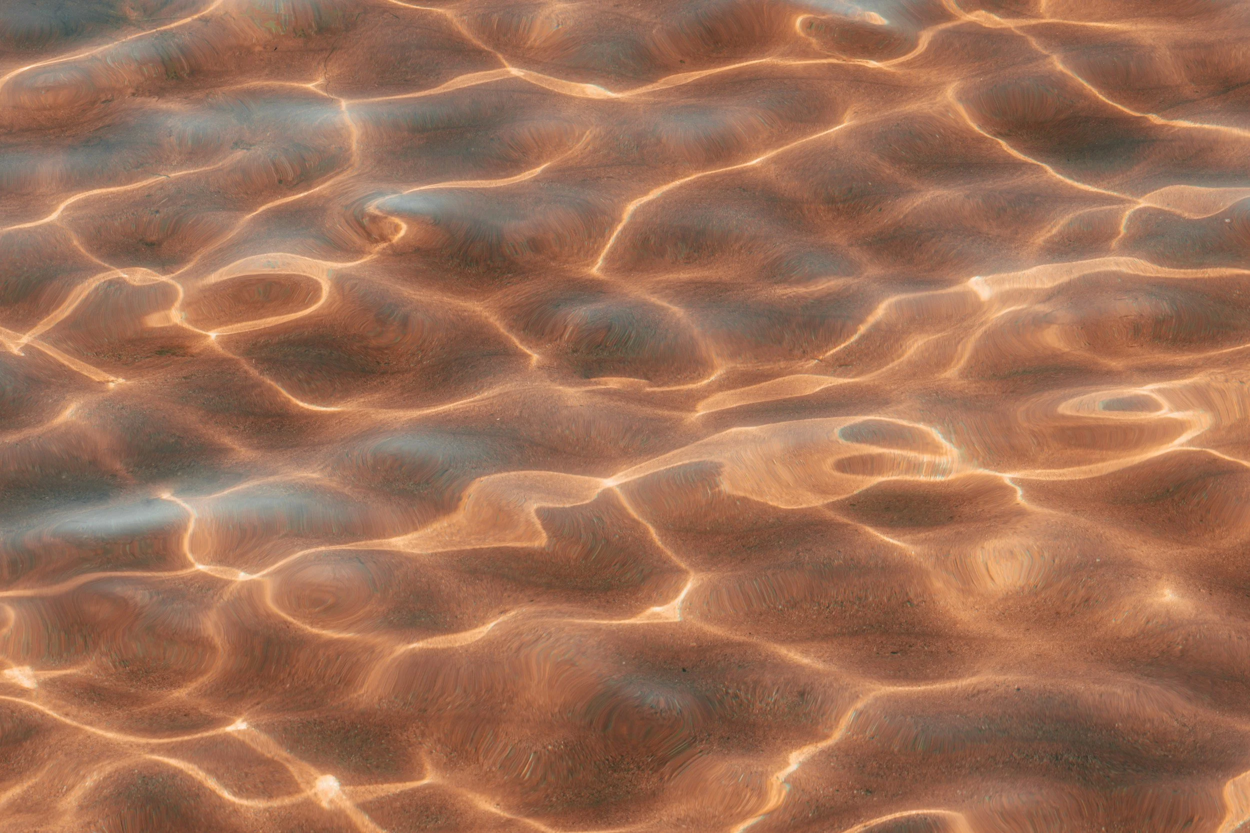 Soft light reflecting on calm water, a peaceful metaphor for honoring a child or mother’s memory during Mother’s Day grief.