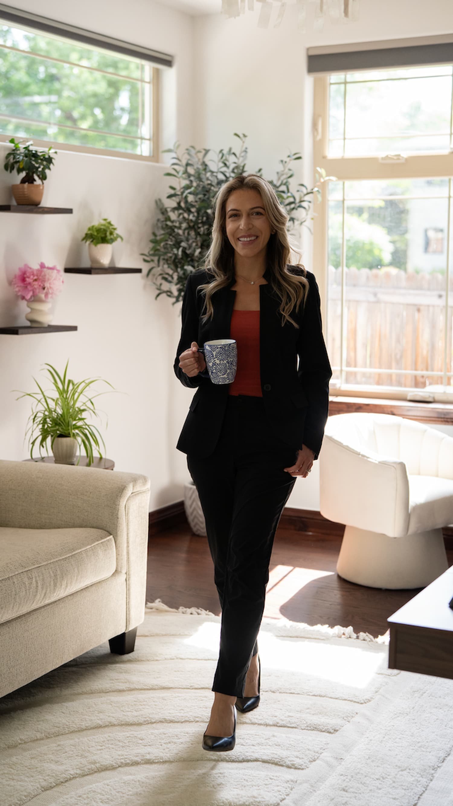 Grief counselor Laura Vargas in a welcoming therapy setting in Denver