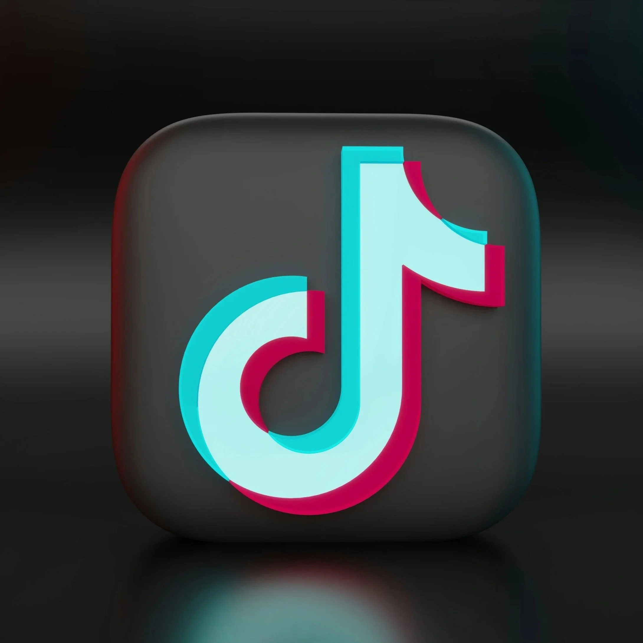 TikTok app logo with white musical note icon on a dark, rounded square background.