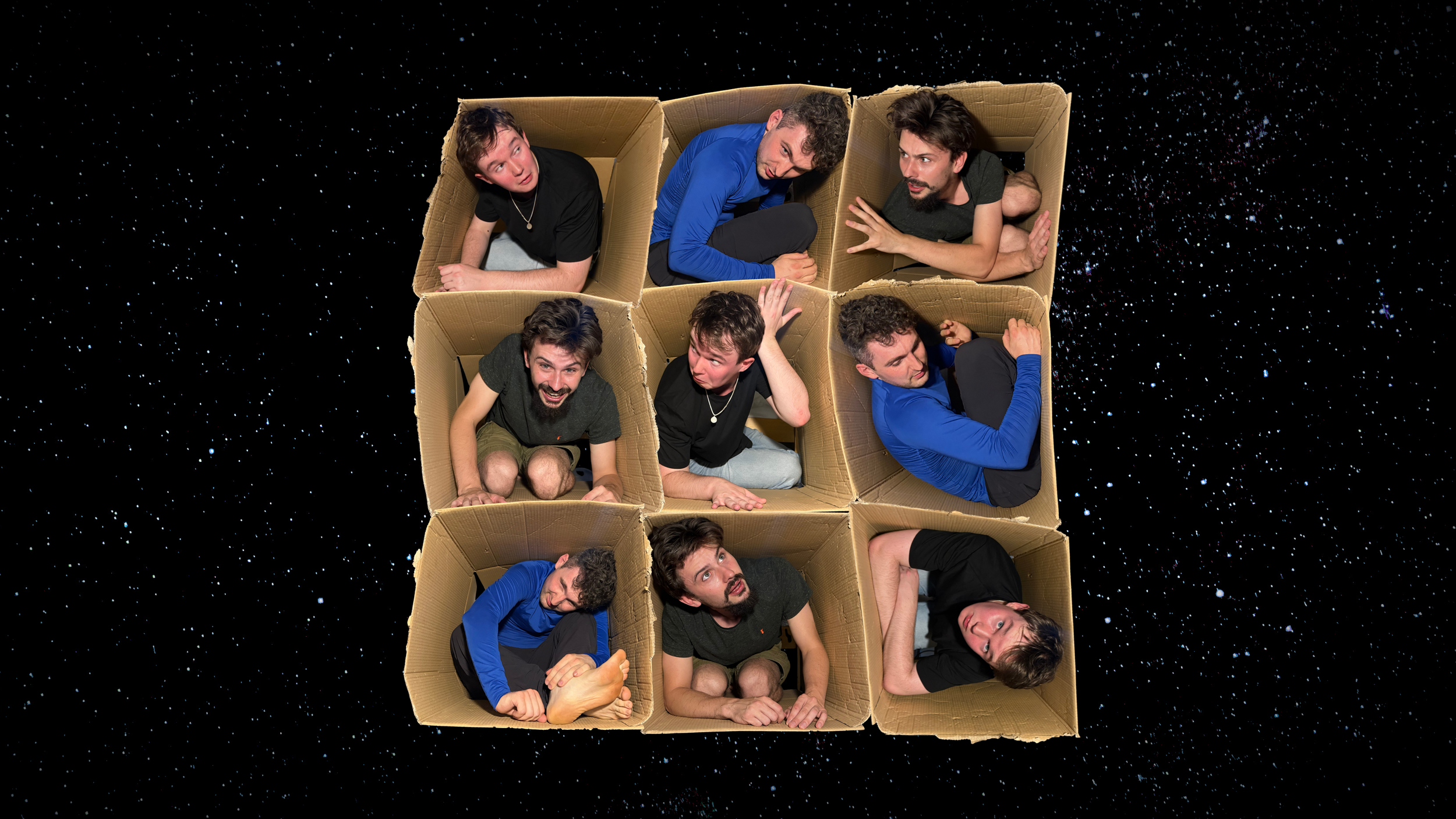 The EN8 team and their clones are hanging out inside cardboard boxes, floating in space amidst stars.