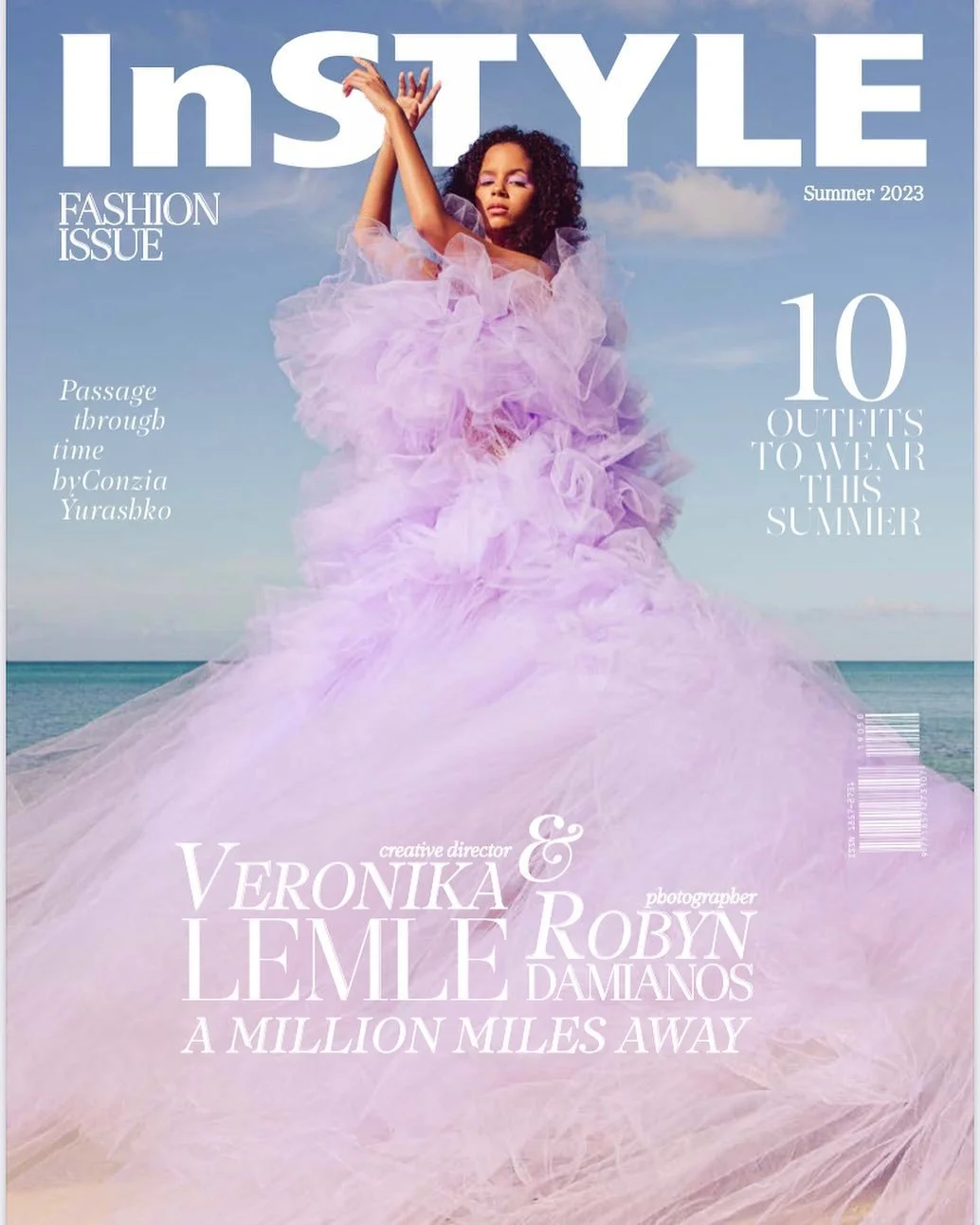 Magazine cover titled InStyle Summer 2023 fashion issue featuring a woman in a flowing, pastel pink tulle gown standing on the beach with the ocean and sky in the background.
