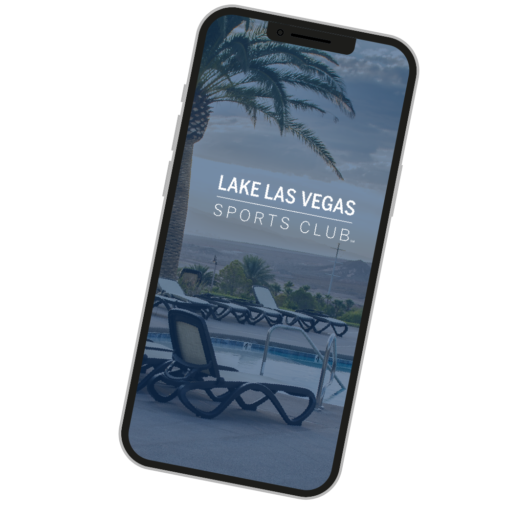 A phone screen displaying the Lake Las Vegas Sports Club app, with a background of poolside lounge chairs, a pool, palm trees, and a cloudy sky.