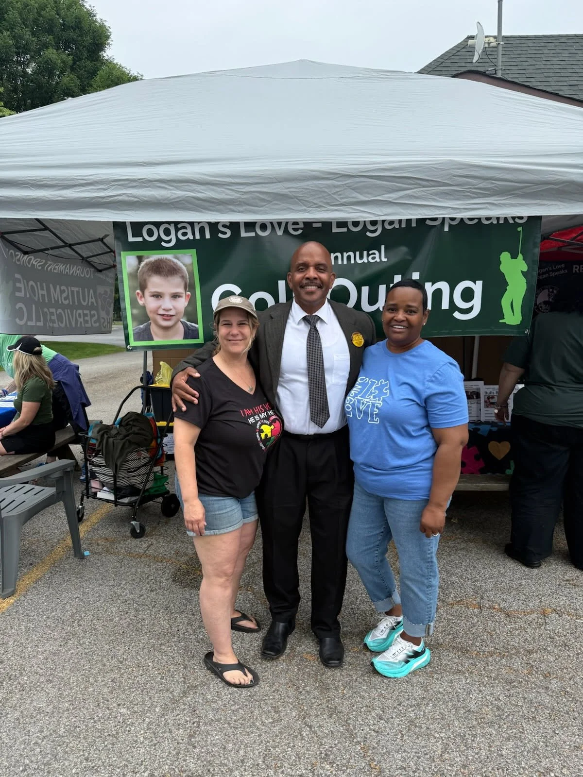 Supporters of Edward Jenkins for Lake County, Indiana Sheriff with Edward Jenkins, deputy chief of police for Lake County, at the event 'Logan's Love - Logan Speaks Annual Gold Outing.'