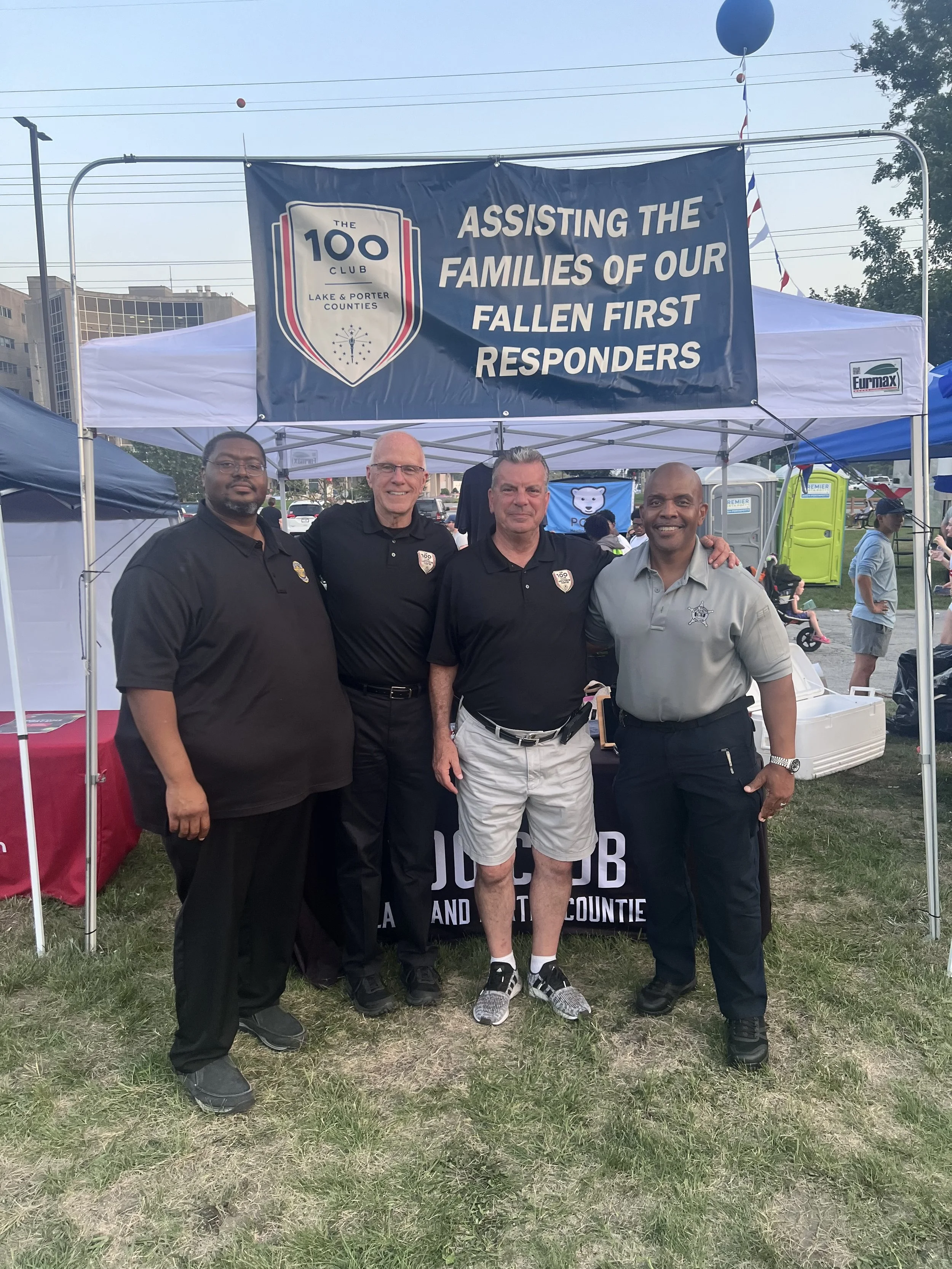 Supporters standing with Edward Jenkins for Lake County, Indiana Sheriff, the current deputy chief of police for Lake County, at an event featuring 'Assisting the families of our fallen first responders.'