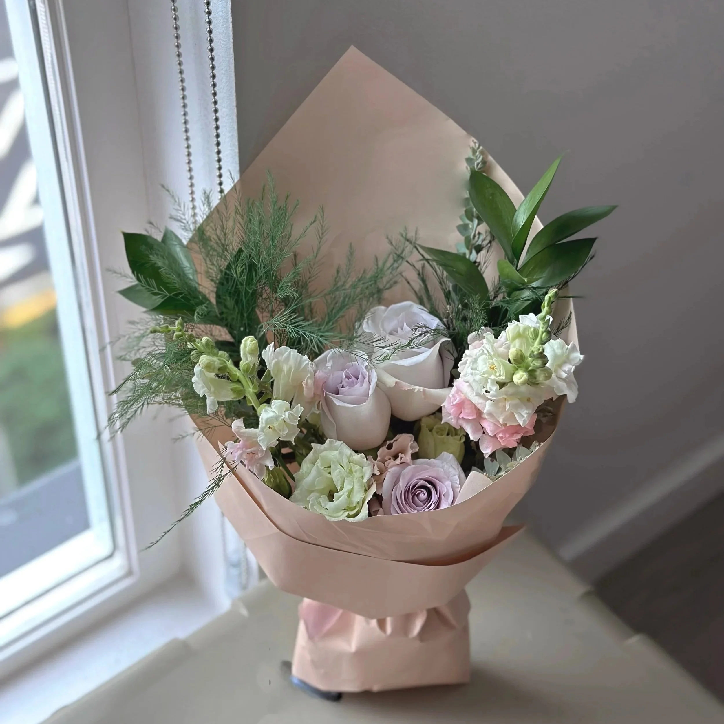 Petite bouquet with roses and snapdragons — bespoke floral arrangement Seattle