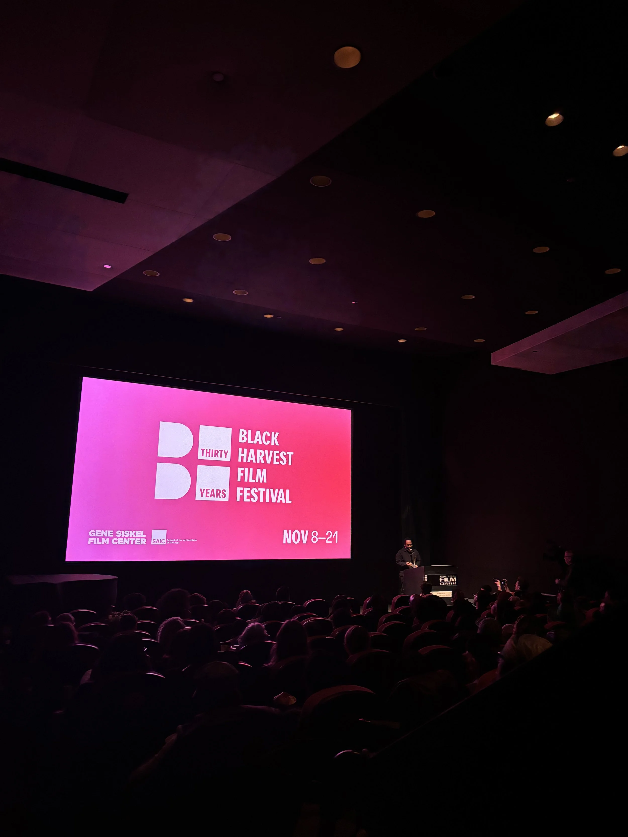 On screen slide at opening night