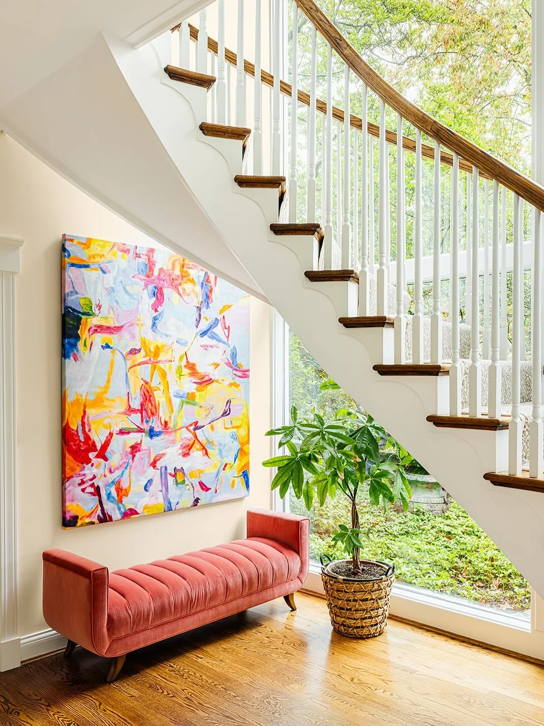 An oh-so-chic welcome home, this elegant curved staircase and light-filled foyer got its glow-up! We can&rsquo;t wait to share more photos from our recent shoot in this stunning mid-century home! 💕 
 
📷 @haileybollingerphoto 

#windinglaneinteriors