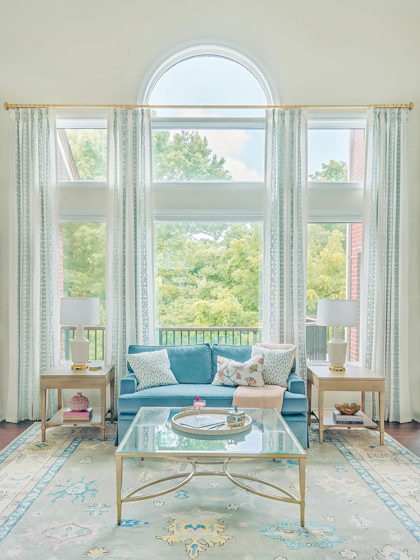 Happiness is&hellip; a complete Living Room makeover!  This grand space with its tall windows and high ceilings needed an update. We created a new floor plan, lightened the wall color, added drapery panels to highlight the gorgeous view, and brought 