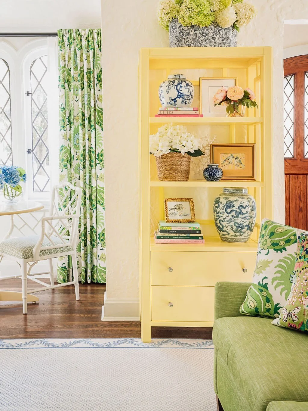 Fresh, colorful, and full of charm&mdash;this living room feels like a spring fever dream come to life. A playful mix of patterns and hues creates a joyful, whimsical atmosphere, balanced beautifully by elegant finishes and timeless furnishings, like