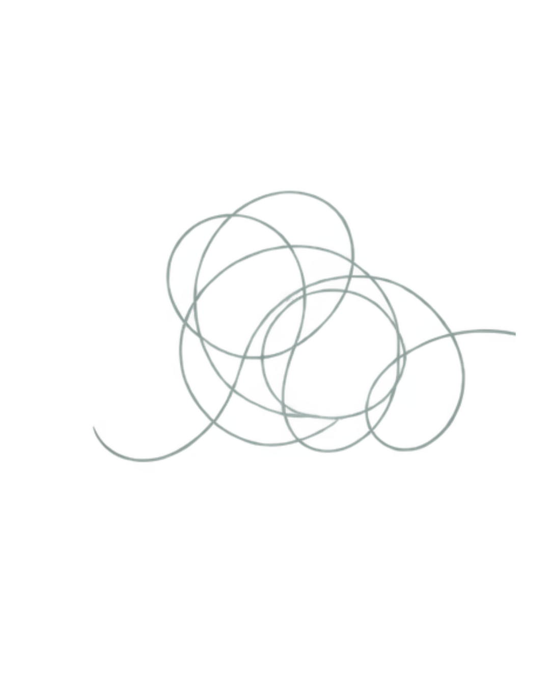 Multiple rubber bands tangled together on a white surface.