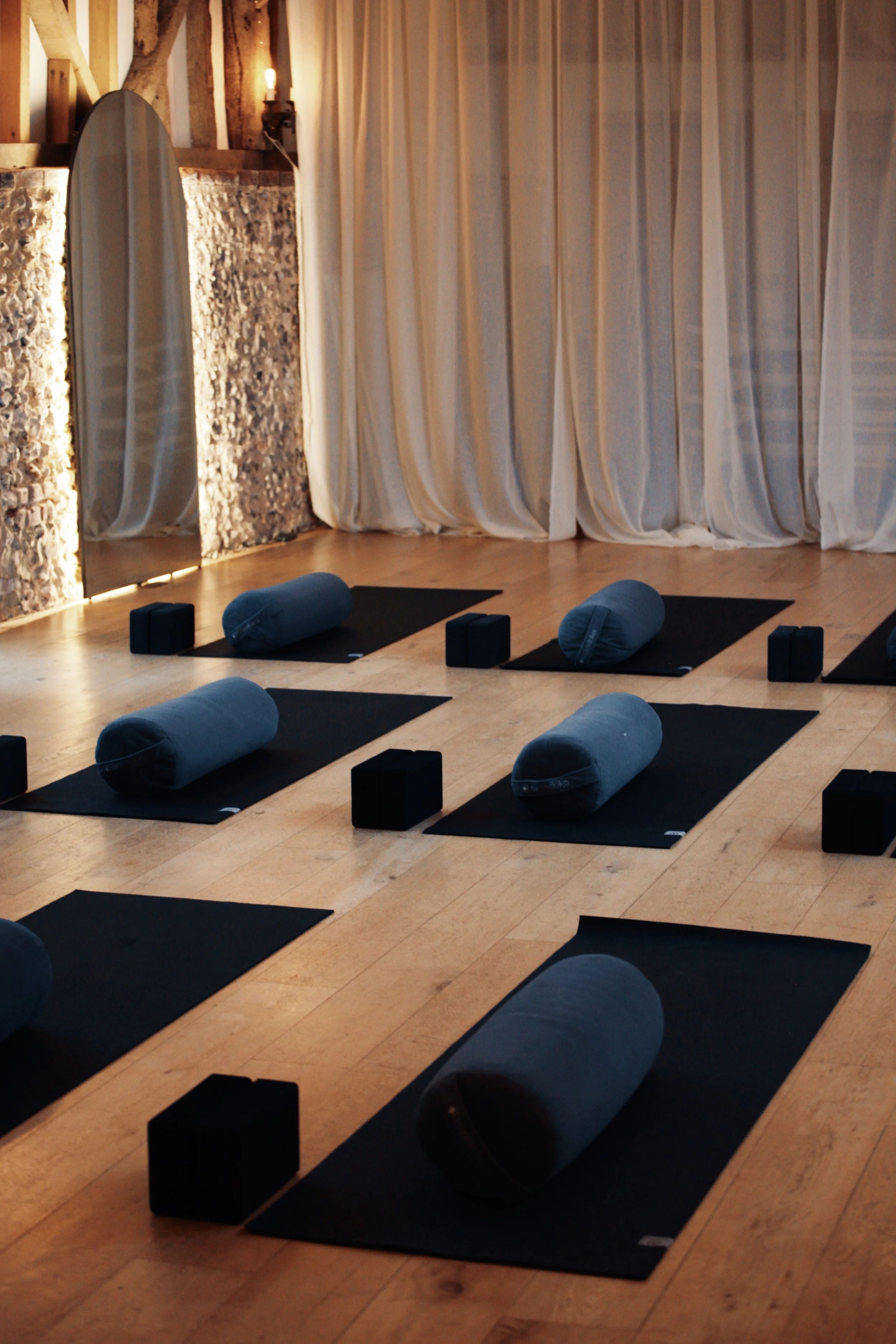 Calm and welcoming yoga teacher training studio prepared for practice, learning and personal development at SoulSpace Academy.