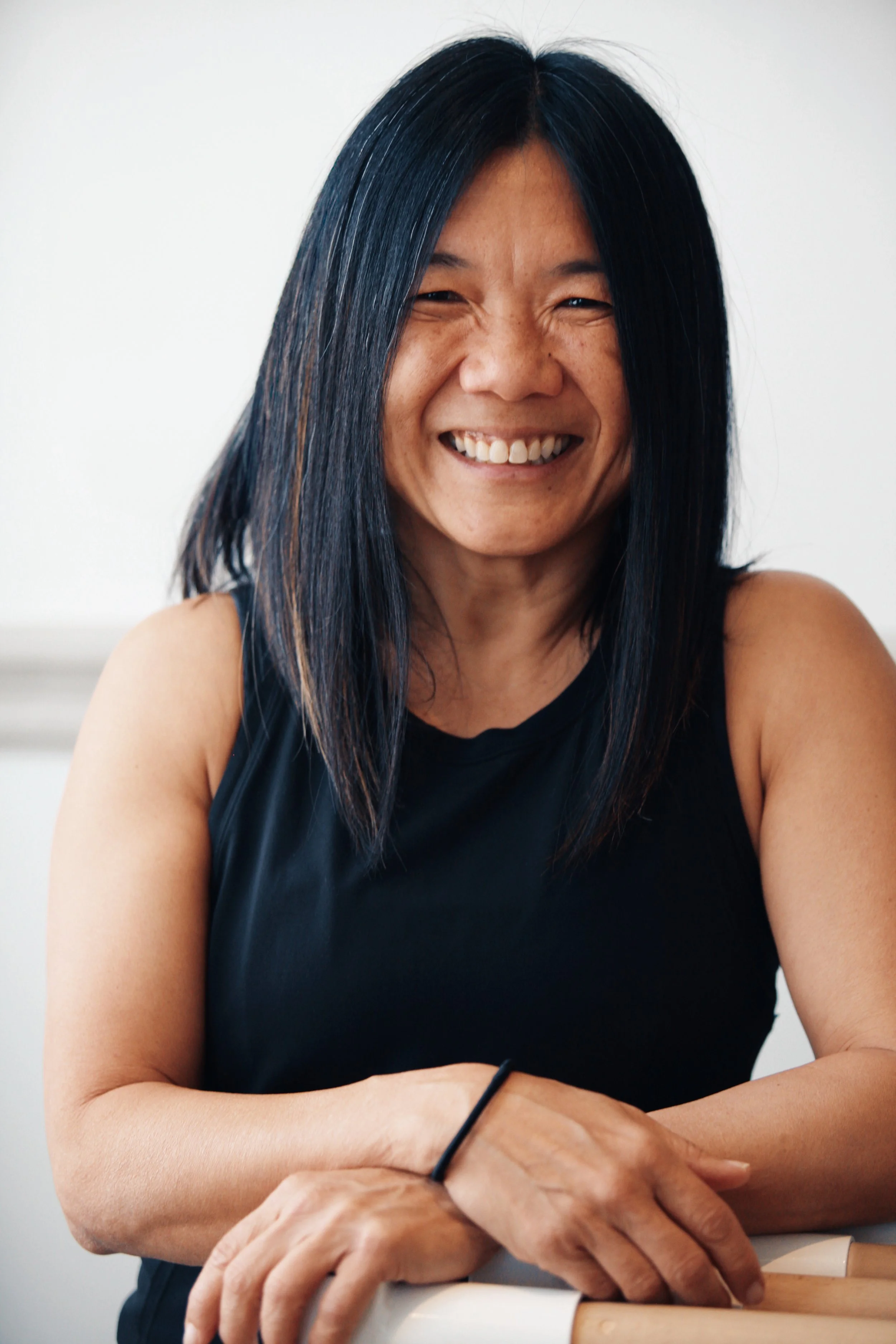 Julie Lee, yoga educator and teacher trainer at SoulSpace Academy, supporting students through mindful movement and personal development.