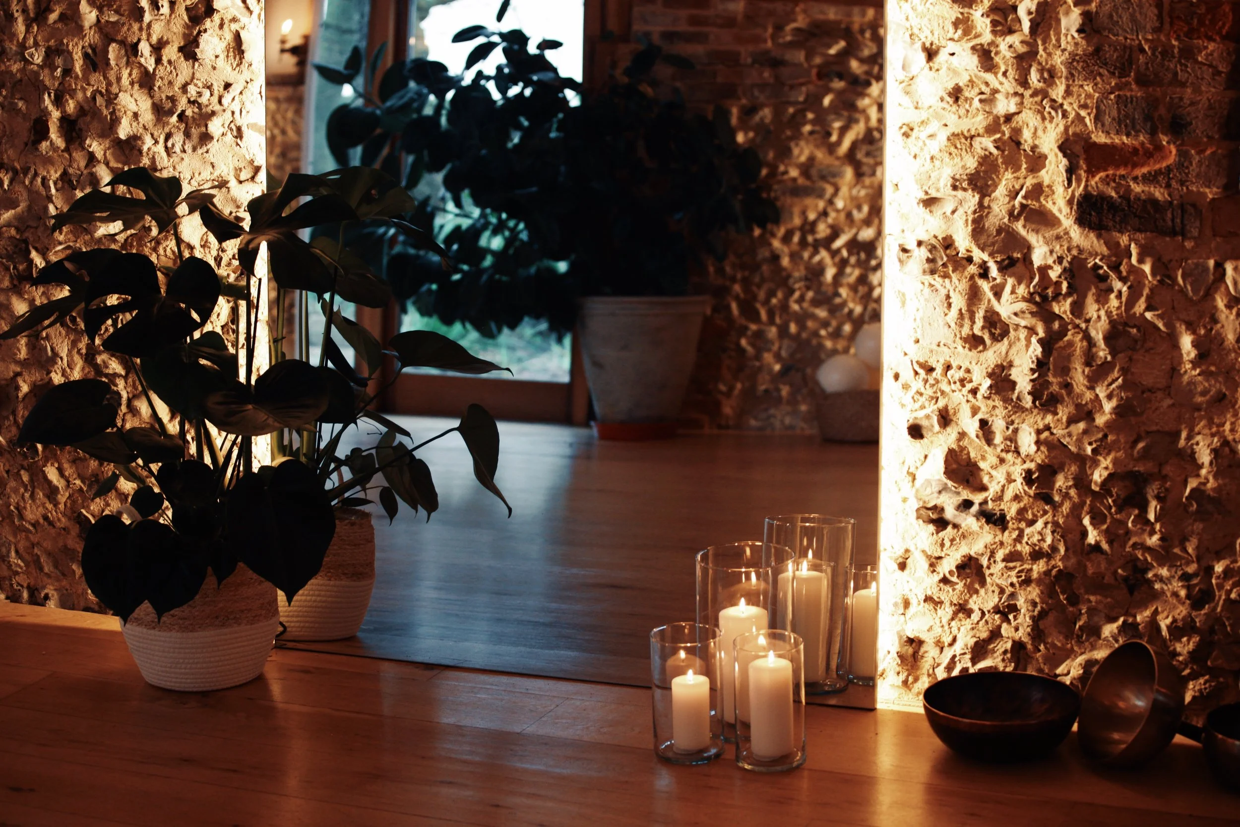 Candlelit entrance to the SoulSpace Academy teacher training studio, creating a calm and welcoming learning environment.
