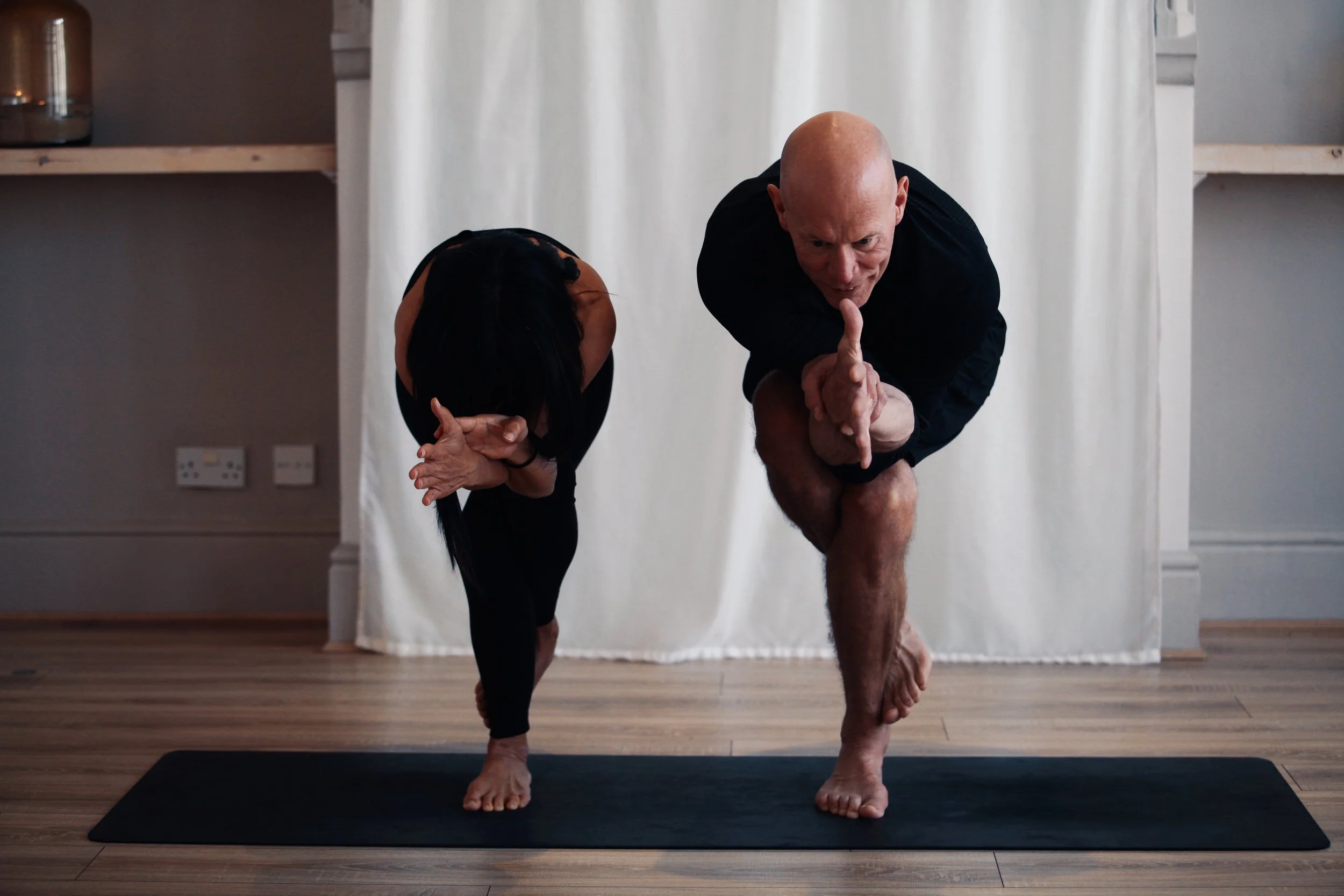 Students developing balance, concentration and embodied awareness during Bhānumatī Yoga teacher training.