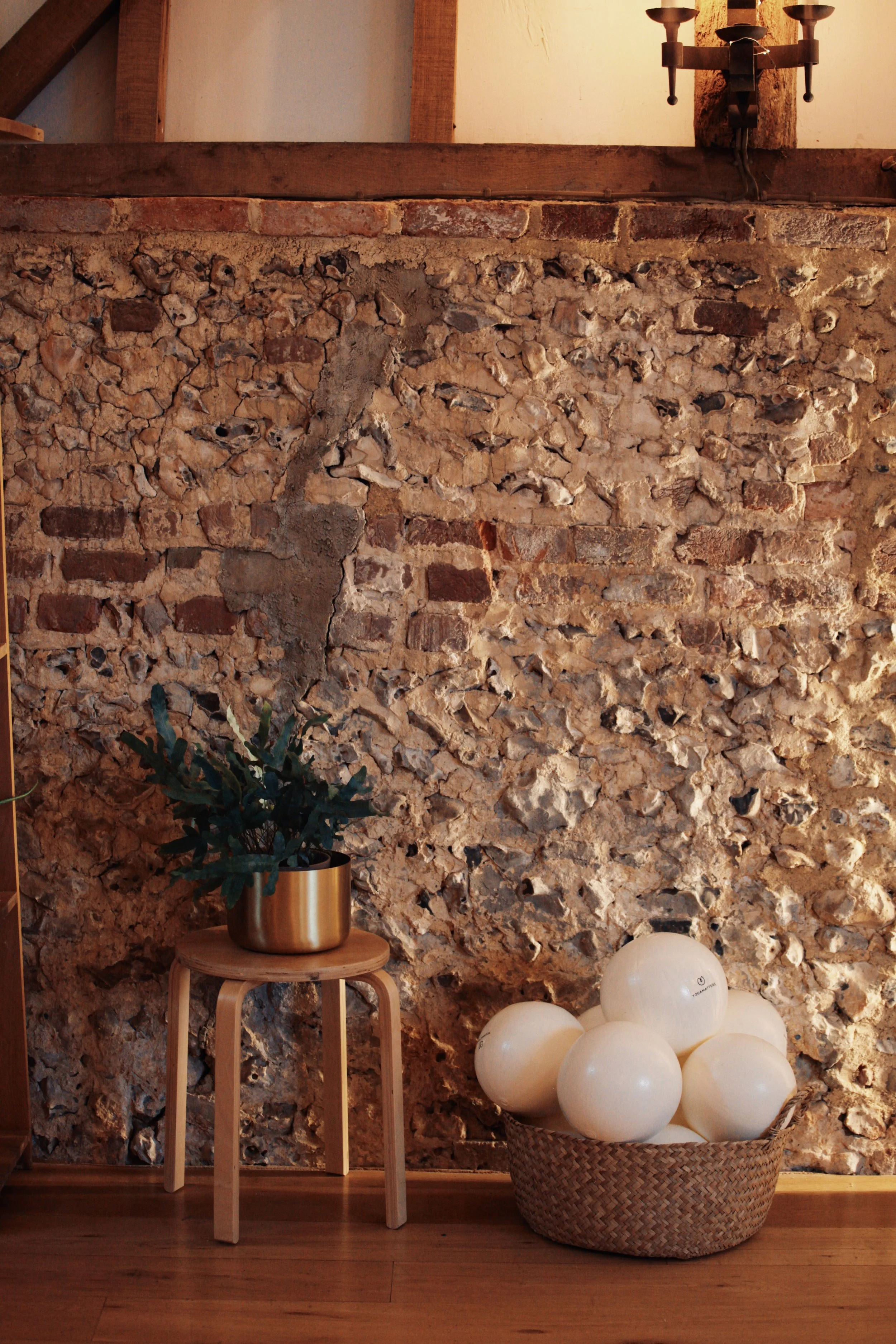 Thoughtfully designed wellbeing studio space at SoulSpace Academy with movement props and natural styling.