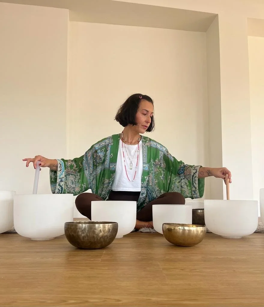 Simona leading sound healing practice as part of holistic Yin yoga teacher training at SoulSpace Academy.