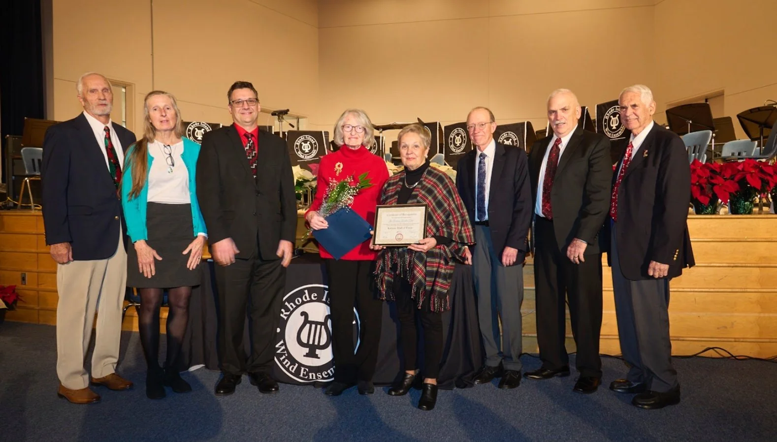 Long-serving members Barbara Colvin and Nancy Mende accept the Scituate Preservation Society Hall of Fame honor.