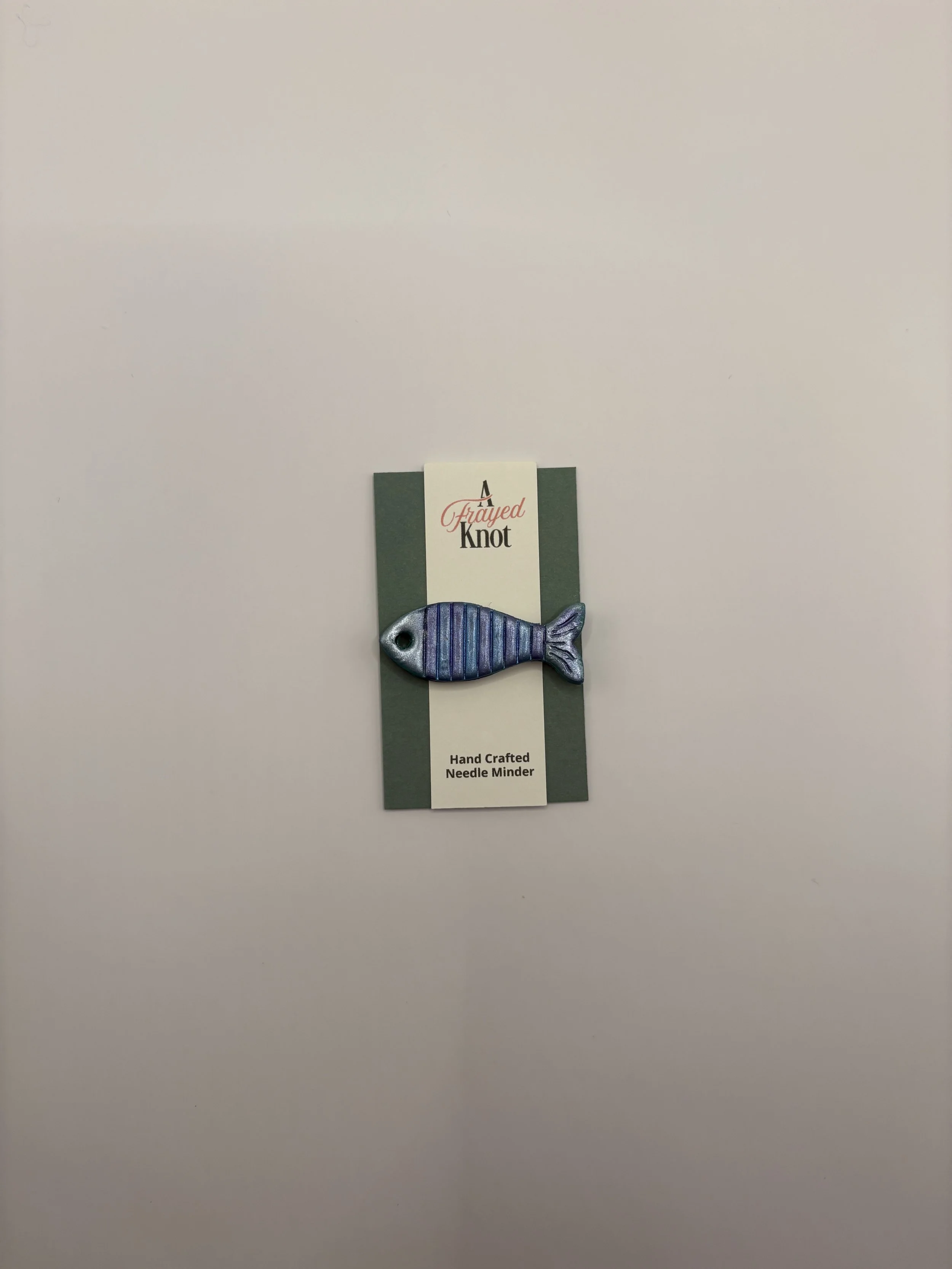 Blue and Purple Striped Fish Hand Crafted Needle Minder