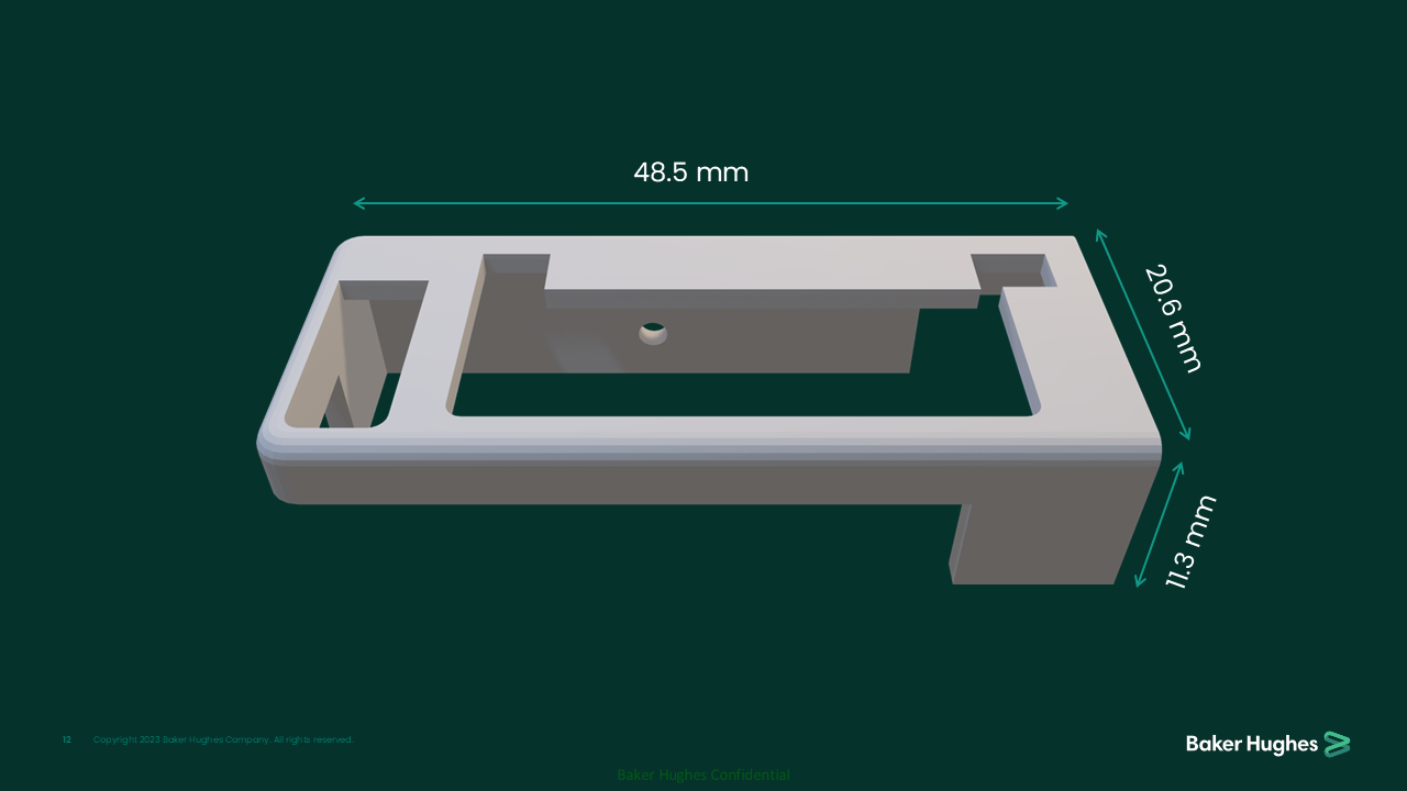 A 3D-printed rectangular object with dimensions labeled as 48.5 mm in length, 20.6 mm in width, and 11.3 mm in height. The object appears to have a hollow rectangular section in the middle and a protruding section on one side. The background is dark green, and there is a small logo in the bottom right corner.