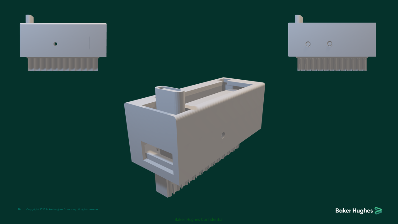 Three metallic electronic components with fins and holes, displayed against a dark green background.