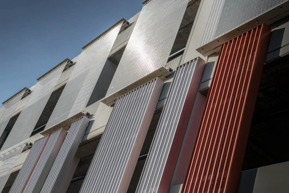 Front view of the building with cladding