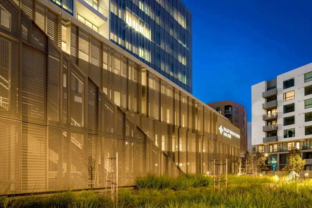 backlit perforated panels at night