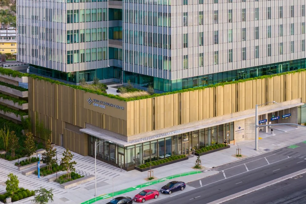 aerial oblique view of mid rise office building with elevated patio