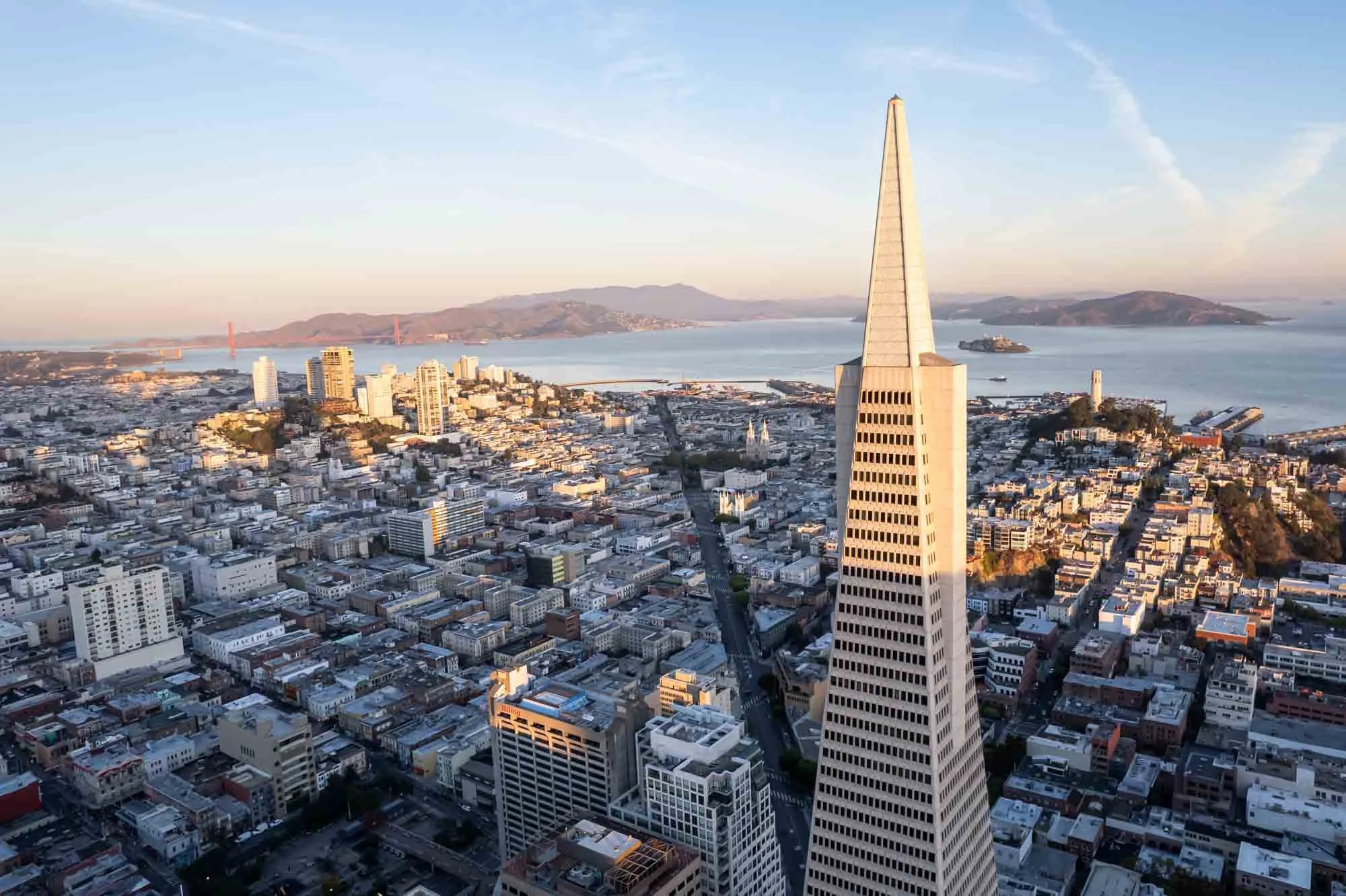 aerial image of Transamerica Pyramid, San Francisco, with Golden Gate Bridge in background