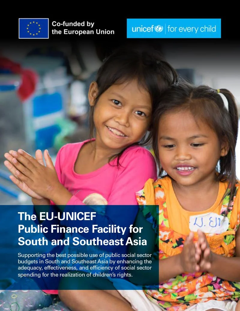 Two smiling young girls sitting together, with logos of the European Union and UNICEF and text about a public finance facility for South and Southeast Asia.