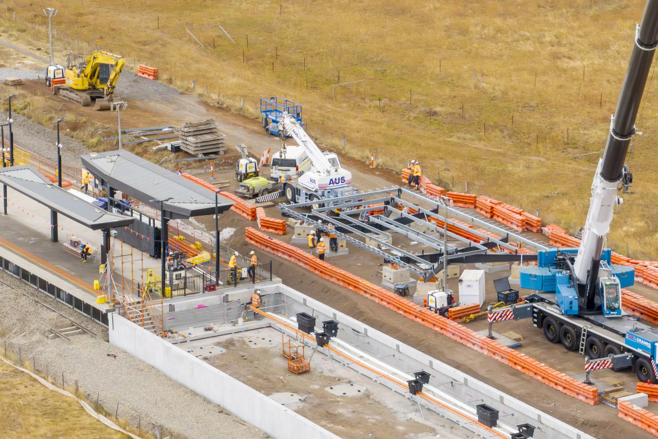 Sunshine Superhub Metro and Freight Package rail construction works with cranes and structural steel near the West Footscray to Albion rail corridor