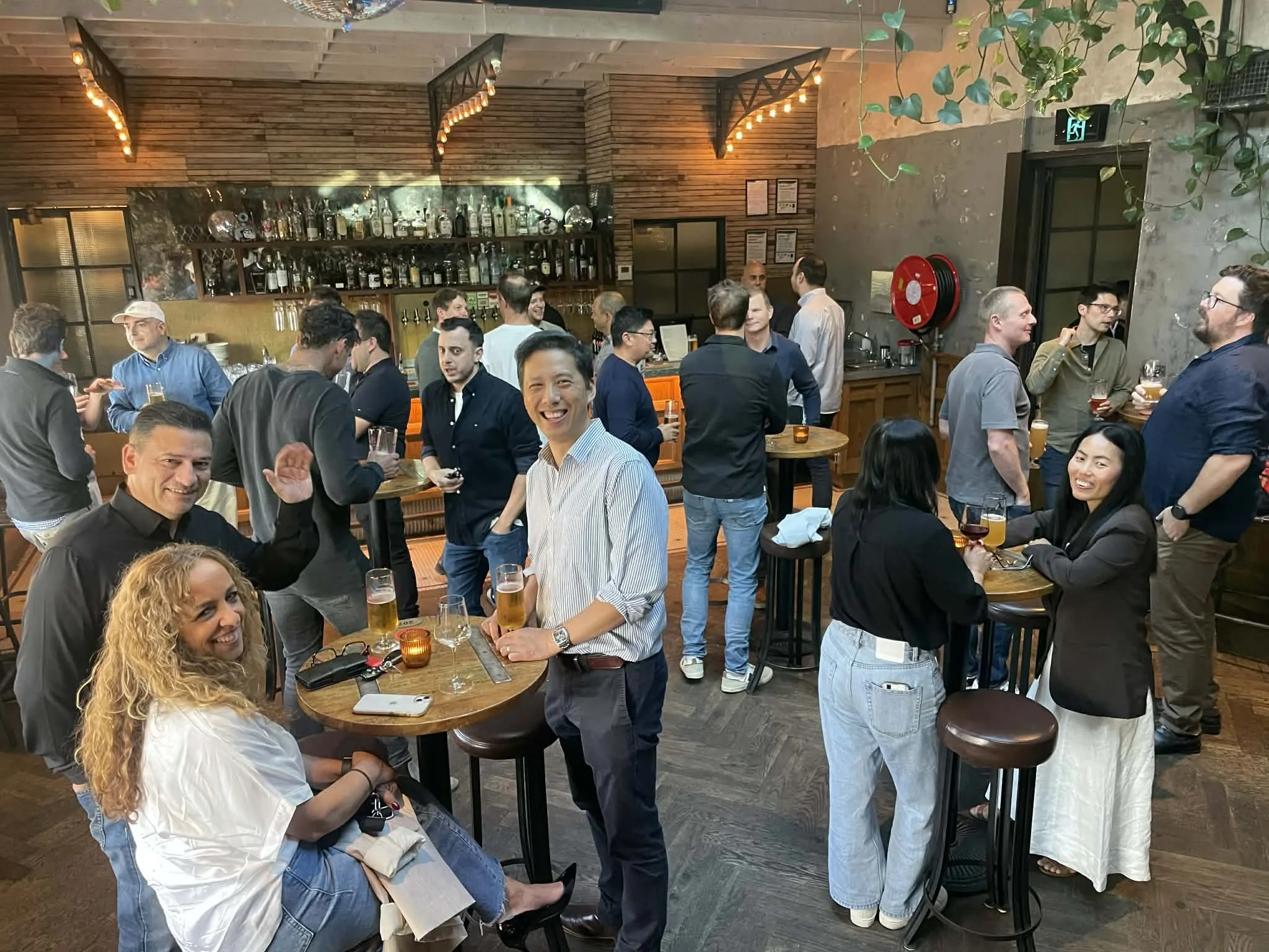 Civil Engineering industry networking event with professionals socialising and discussing projects in a modern hospitality venue.